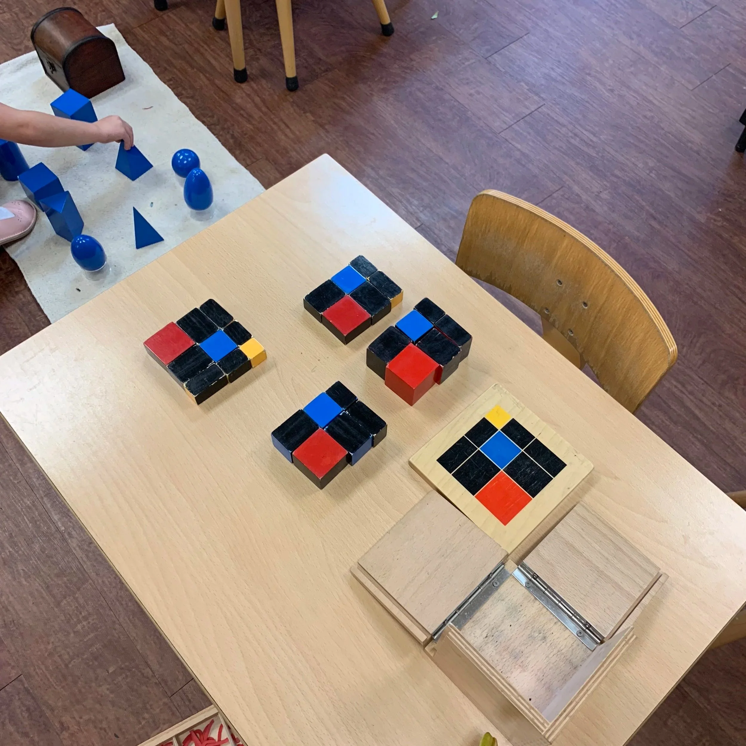  Building the trinomial cube layer by layer helps children internalize algebraic relationships concretely, strengthening spatial reasoning, pattern recognition, and preparation for later abstract math. 