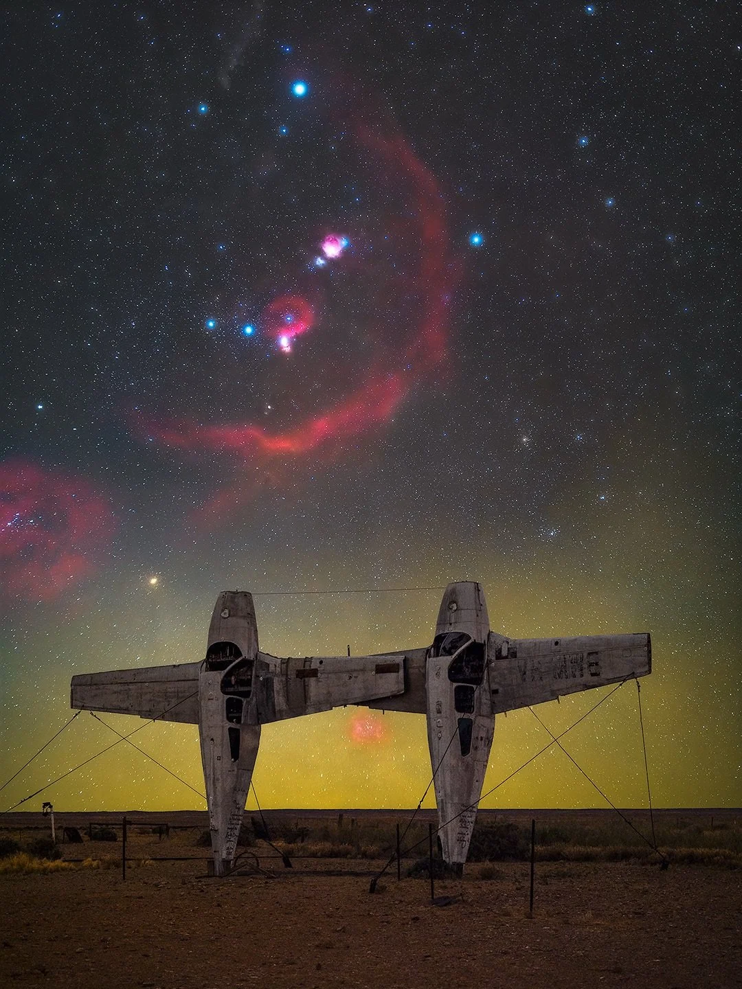 Orion starting its rise over the standing airplanes at Mutonia Sculpture Park off the Oodnadatta Track. 

This was one of those calm nights where everything just lined up. Proper dark skies in South Australia, no light pollution, and Orion slowly cli