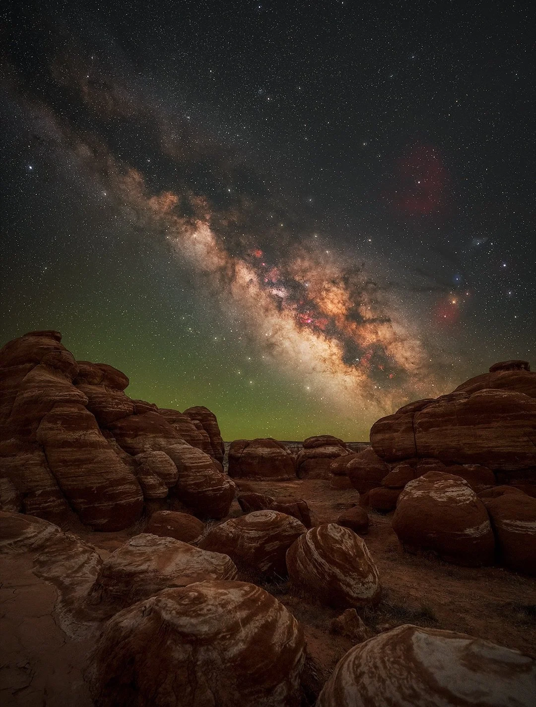 Mudheads Under the Milky Way

Milky Way astrophotography above the Hopi Mudheads, a remote and sacred canyon hidden within the Arizona badlands on the Hopi Reservation.

Rising from the desert floor, these red and white hoodoos were shaped over milli