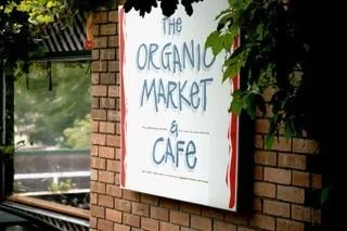 The Organic Market & Cafe logo