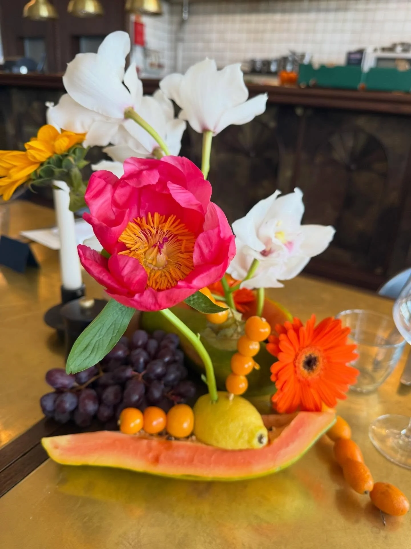 Fruity wedding florals bringing colour, texture, and a playful twist to the table &mdash; where ripe citrus, trailing grapes, and seasonal blooms come together in perfect harmony.

Because your wedding flowers don&rsquo;t have to follow tradition&hel