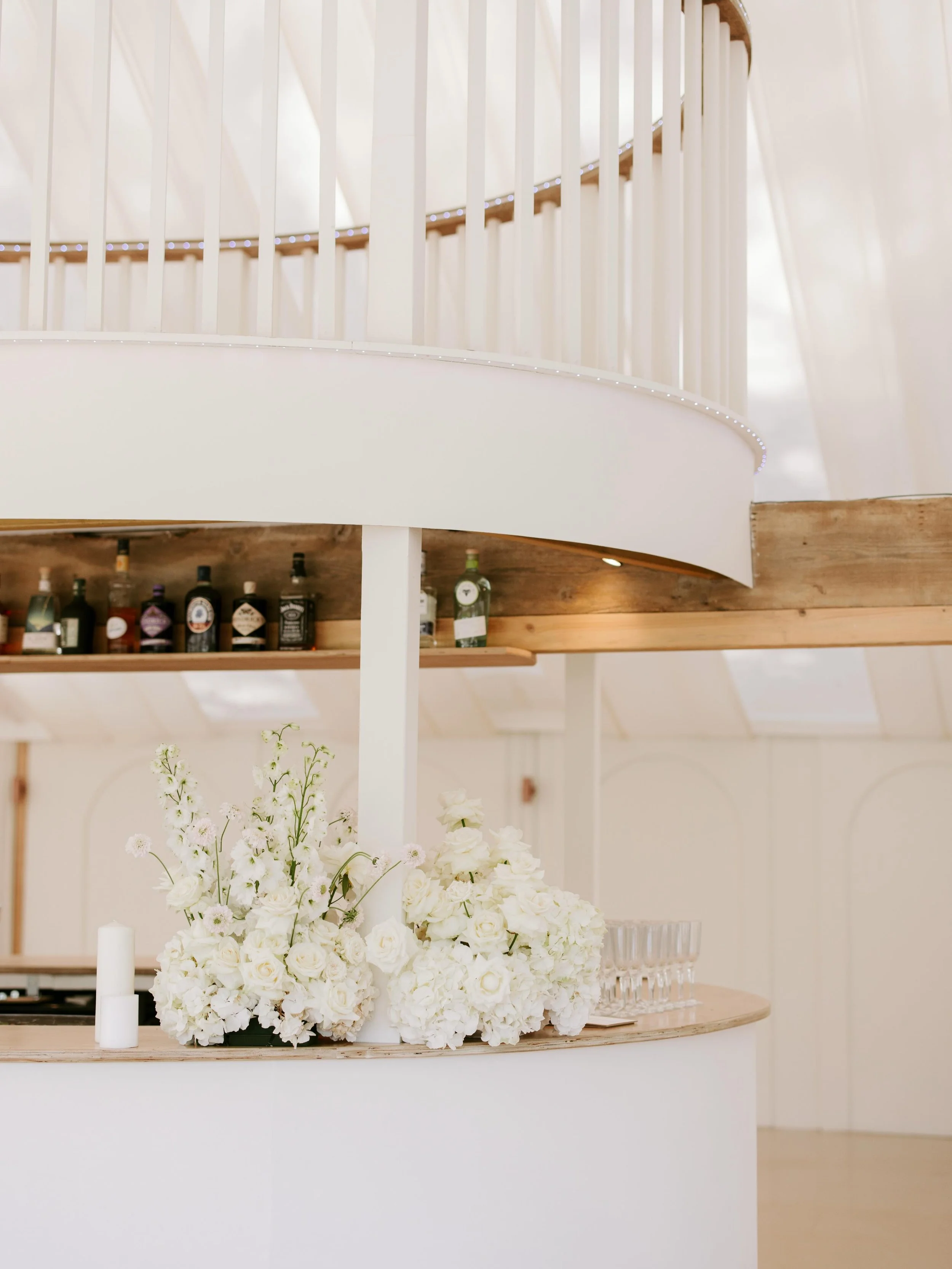 The bar at @ripplecourtestate these beautiful florals were restyled after the couples ceremony. Reimagining your florals in different focal areas throughout the day is such a powerful way to create more impact and keep the feel of of your day flowing