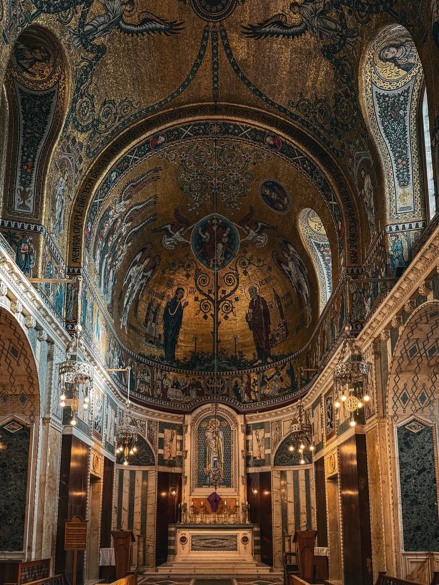 The Lady Chapel in Westminster Cathedral lies at the eastern end, to the right of the main sanctuary. Completed in the 1930s, it is richly adorned with golden mosaics of the life of Mary and houses the 15th-century alabaster statue, Our Lady of Westm