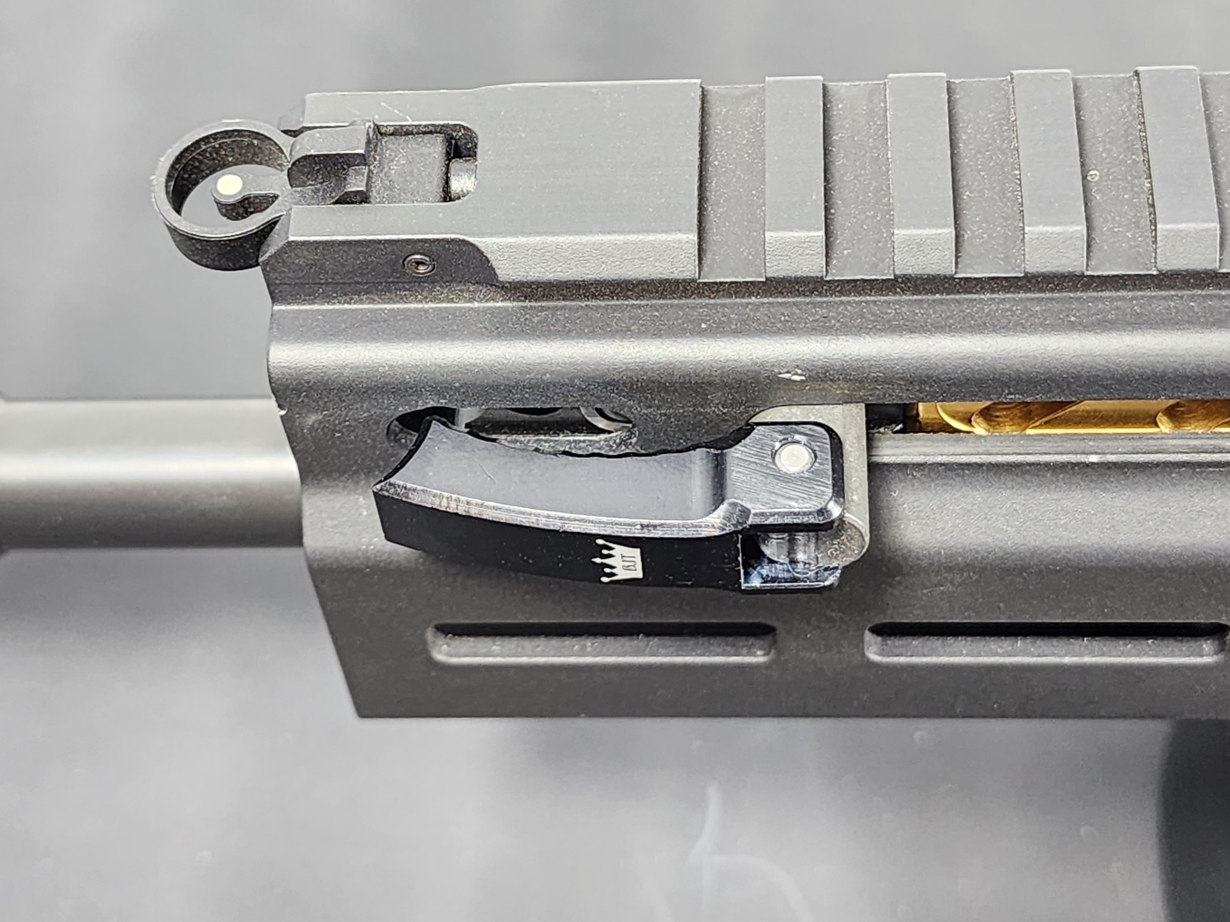 stribog-folding-charging-handle-folded-left-top-installed.jpg