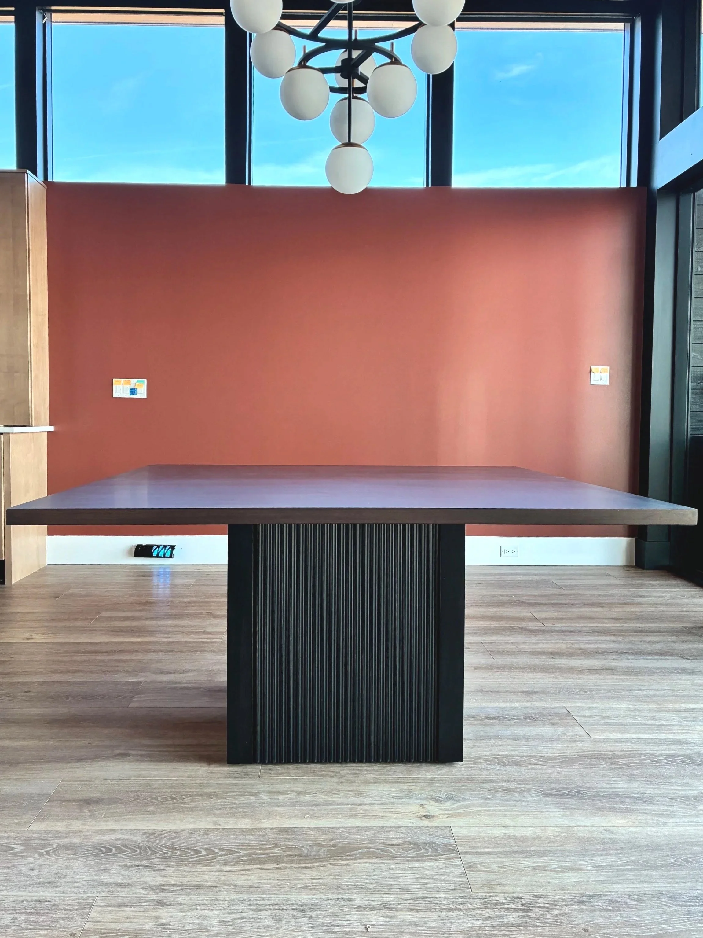 Hard Maple Modern Square Dining Table stained in an Espresso Brown with a custom fluted black stained based
