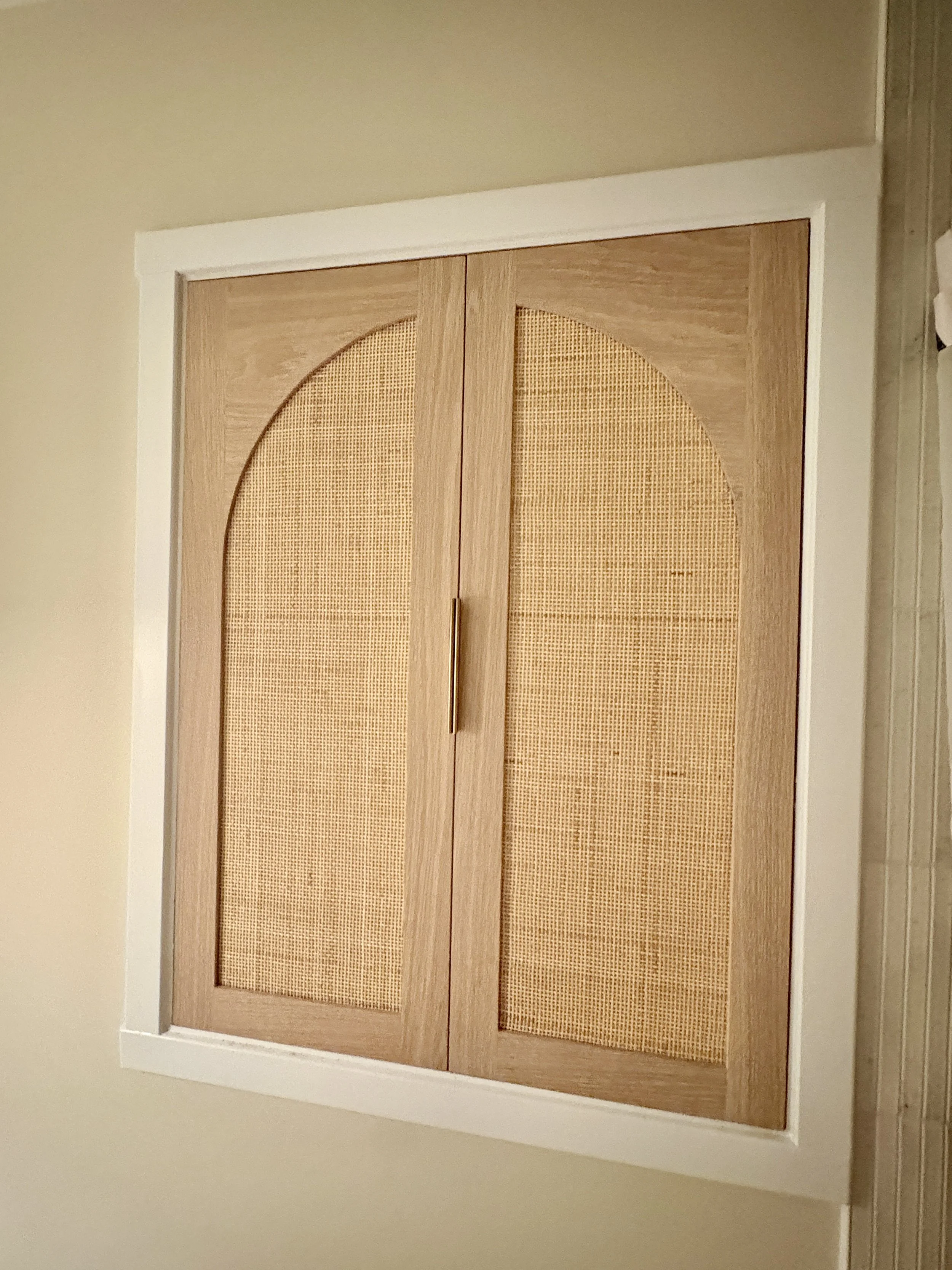 White Oak with cane webbing cabinet doors