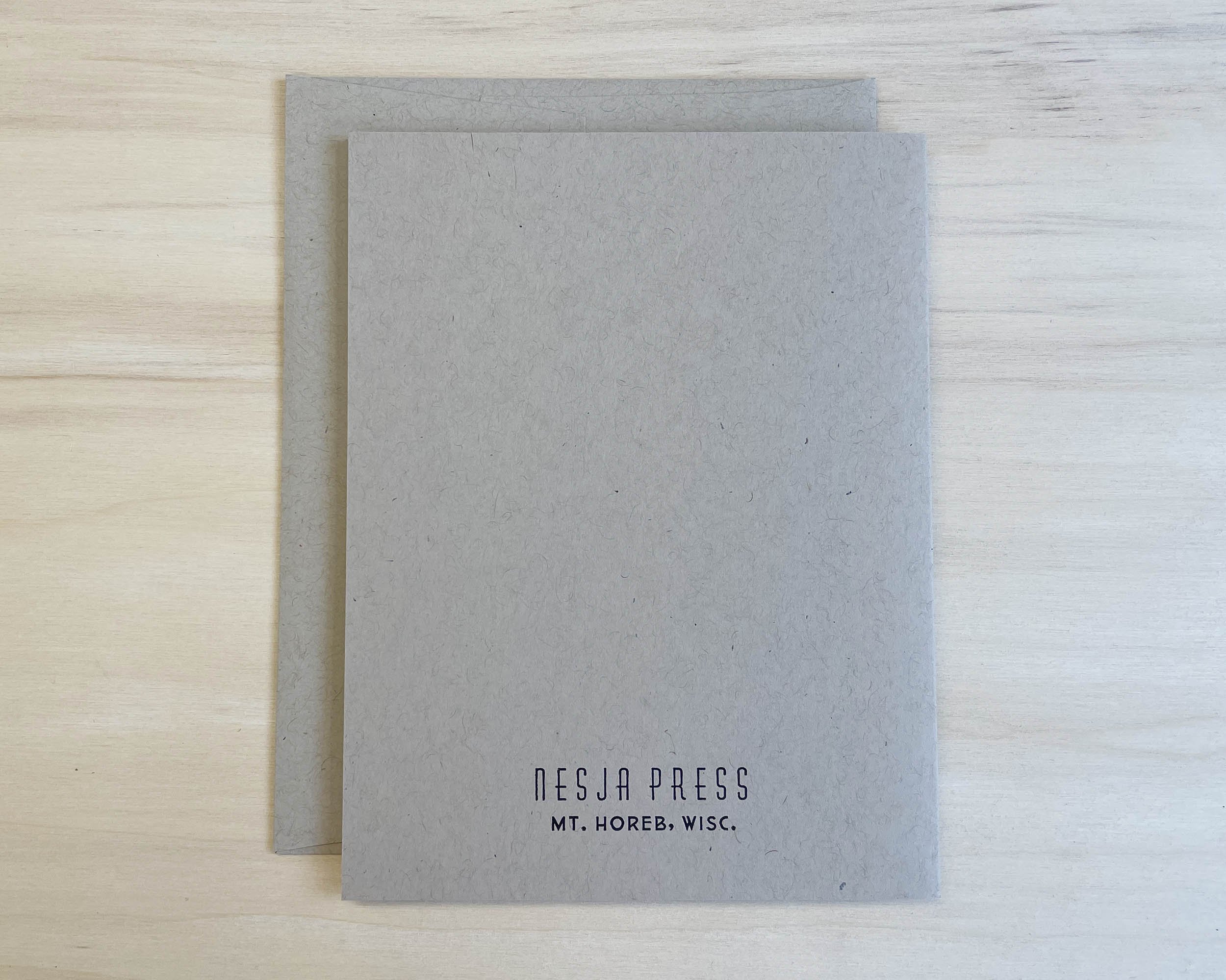 Letterpress greeting card What's New back