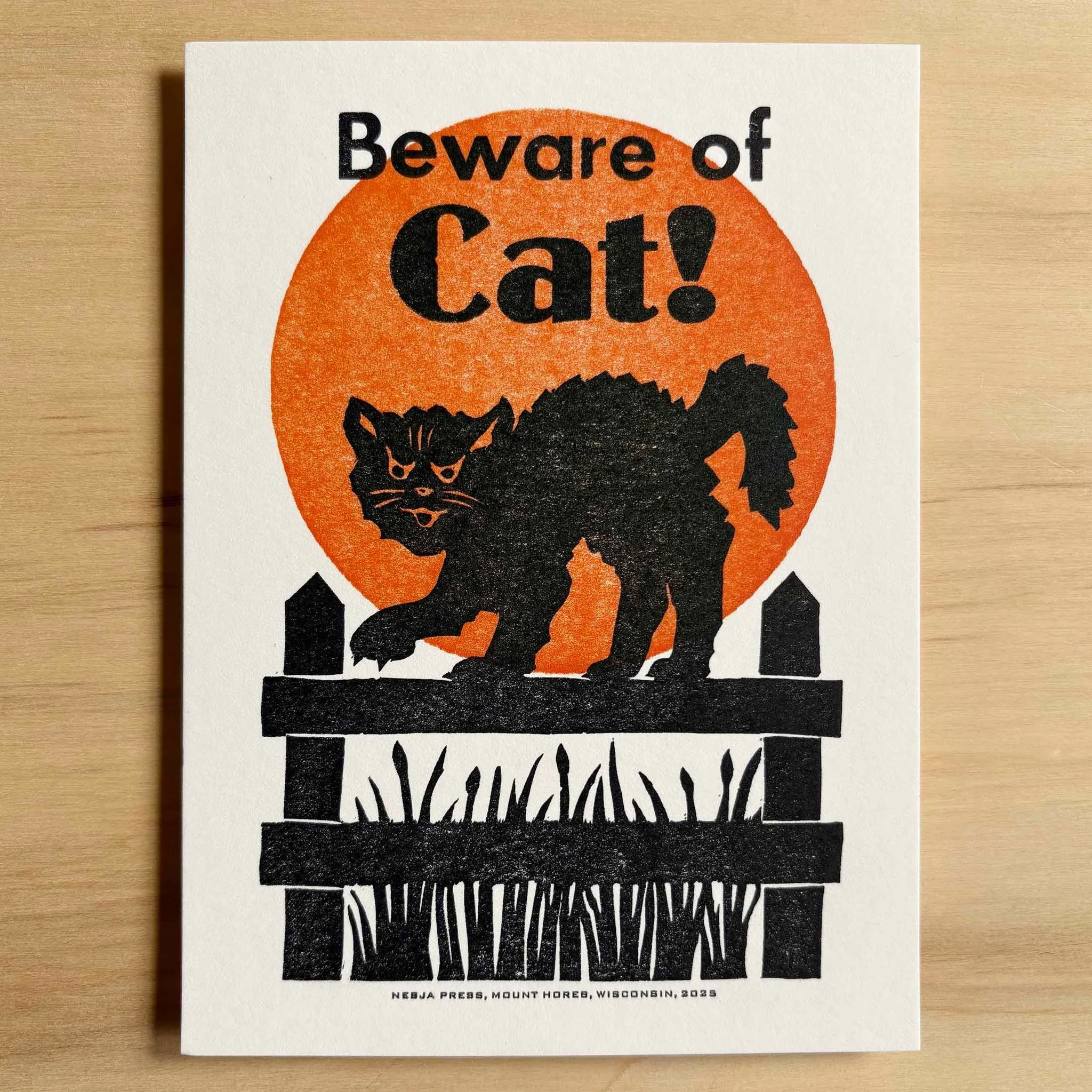 YEEOOWWrrrr! Beware of Cat! 🐈&zwj;⬛ Inspired by vintage Halloween graphics of the 1930s and 1940s, this unique relief art print was designed and printed with hand-carved linoleum, and handset type on a human-powered press. Trim size 5 x 7 inches. Pe