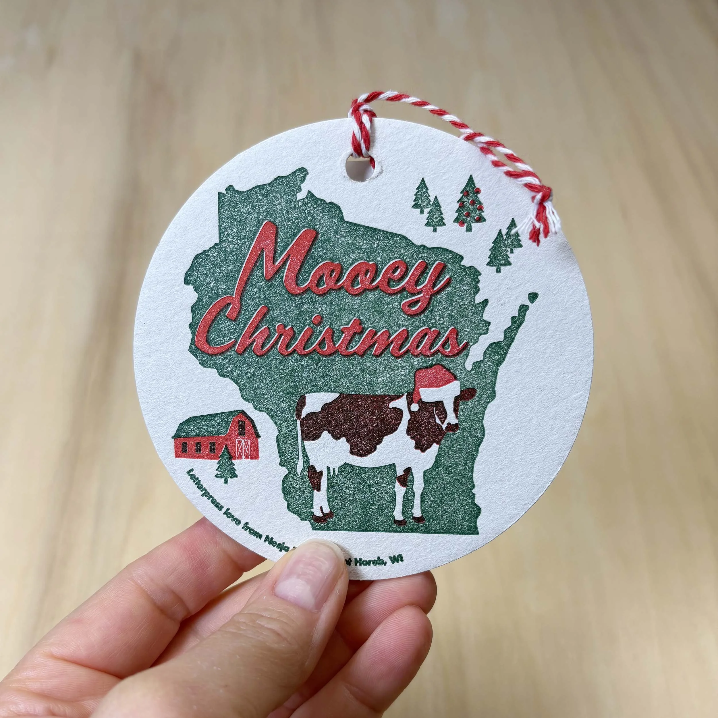 mooey-christmas-wisconsin-letterpress-ornament-irl.jpg