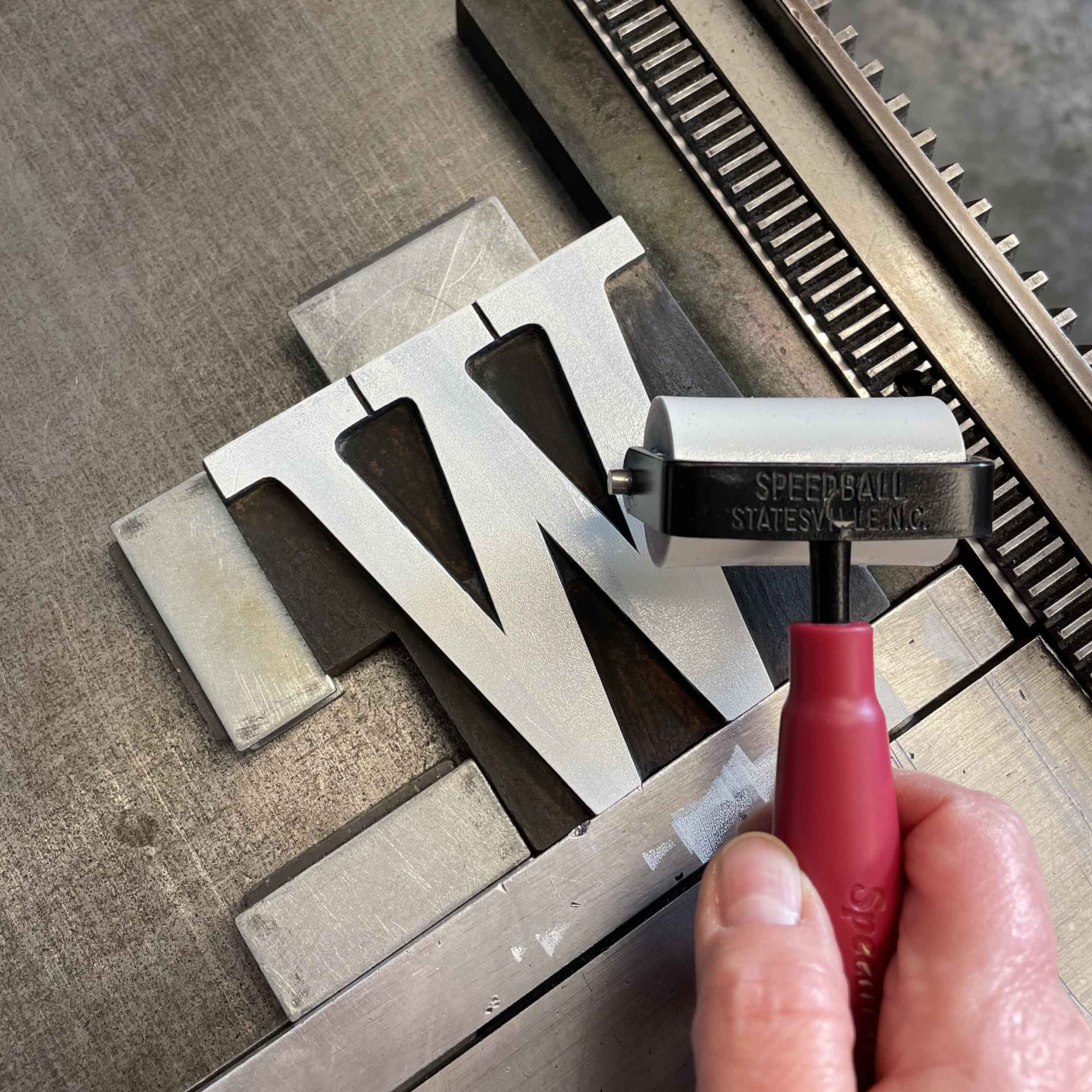 stopping-by-woods-hand-braying-wood-type.jpg
