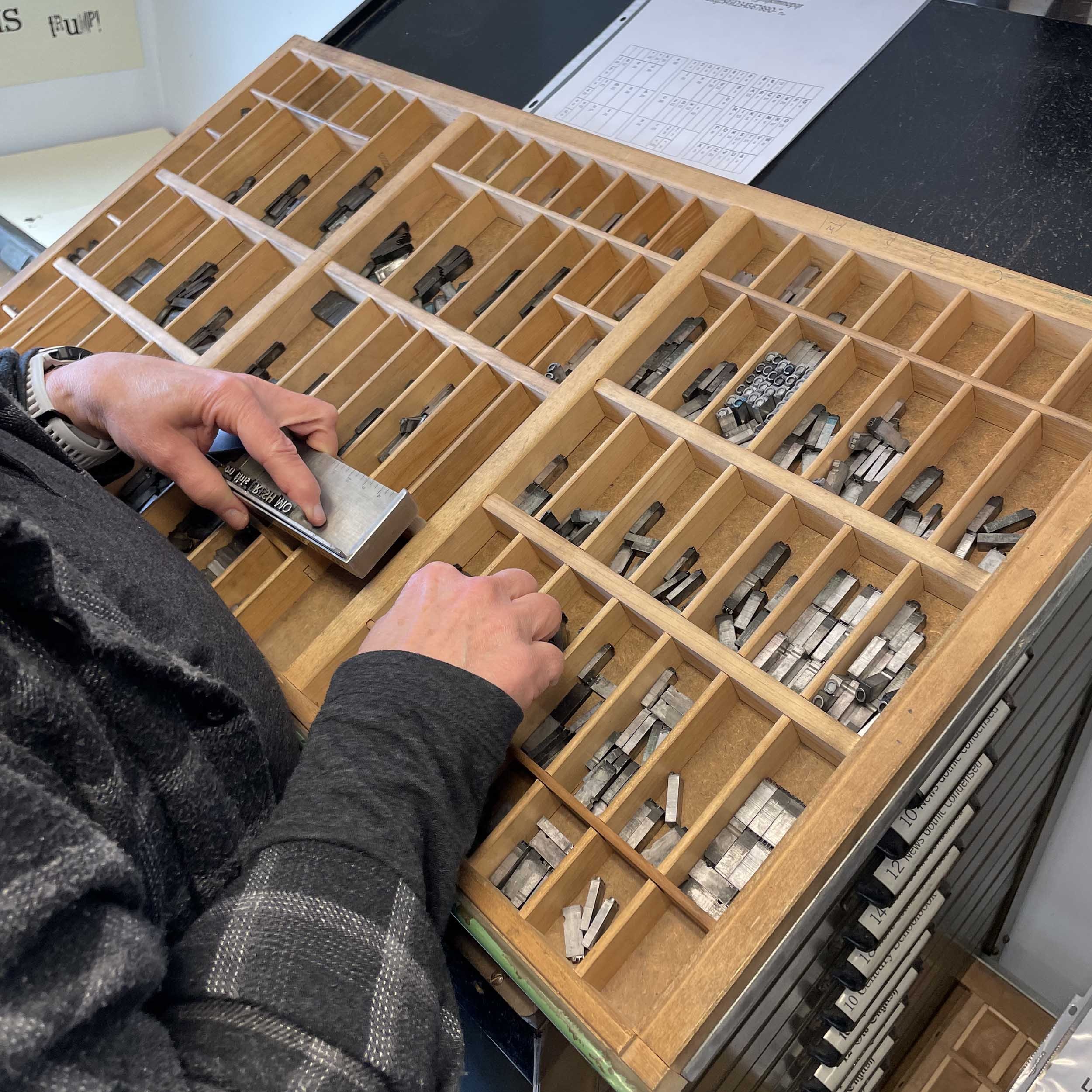 Picking type from a letterpress typecase