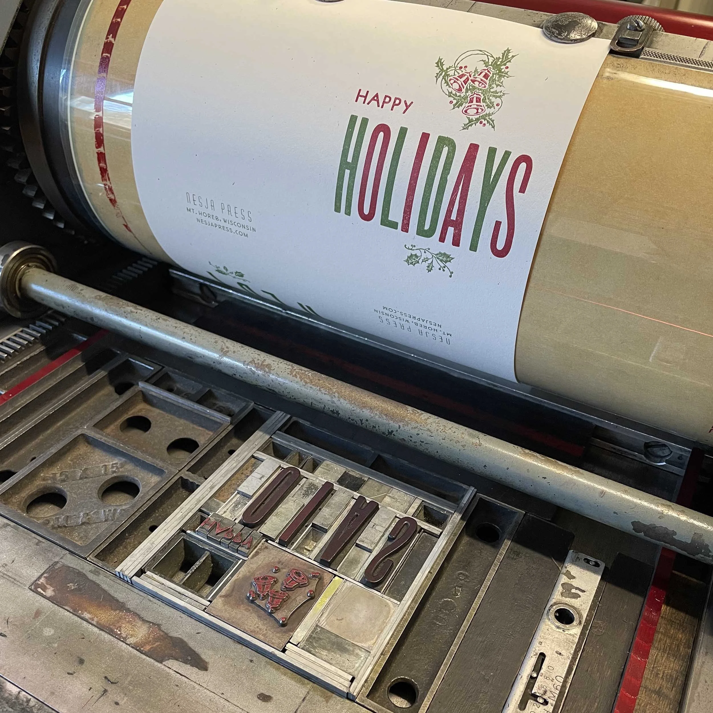 happy-holidays-letterpress-card-red-ink-on-press.jpg