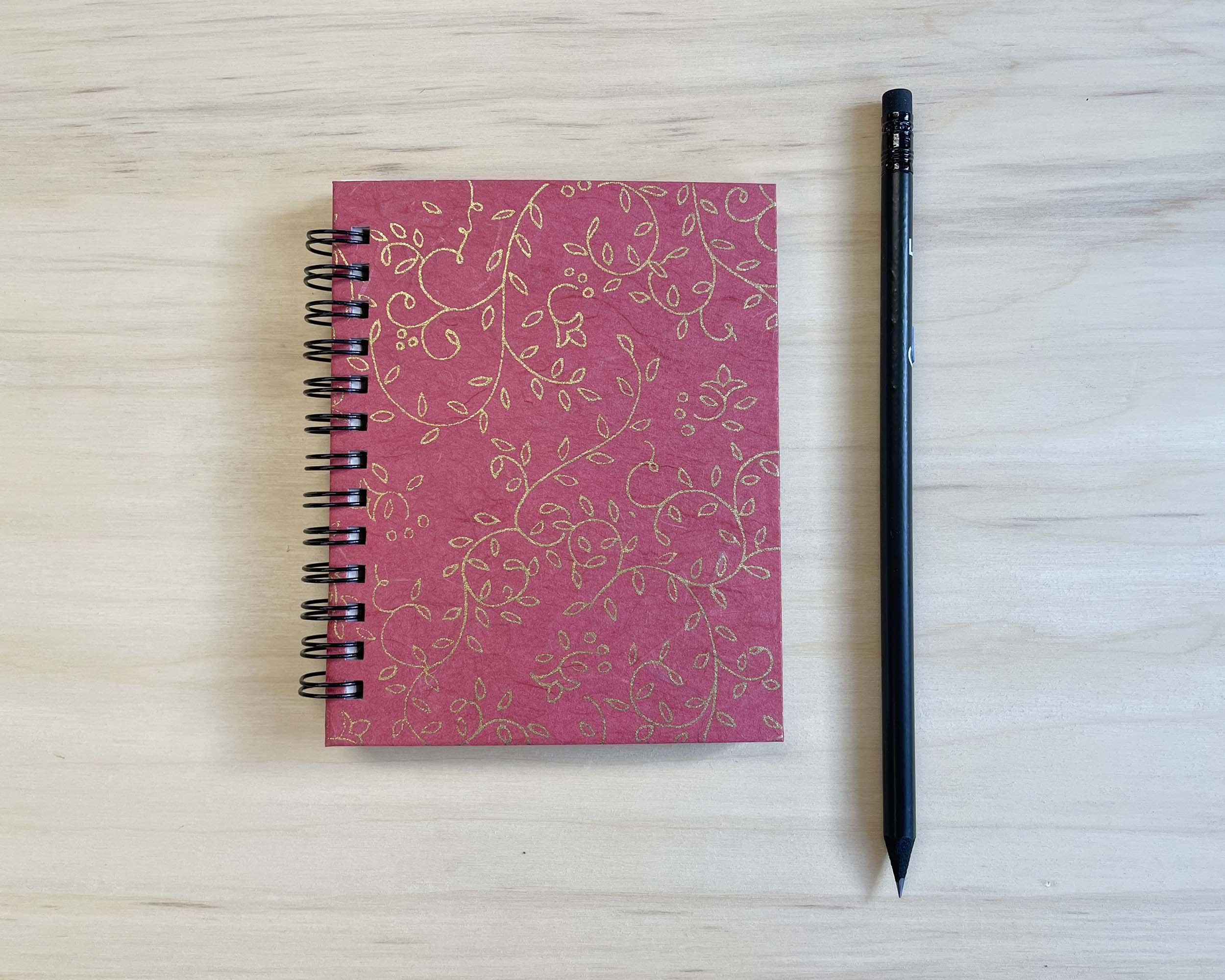 Red with metallic gold vines journal
