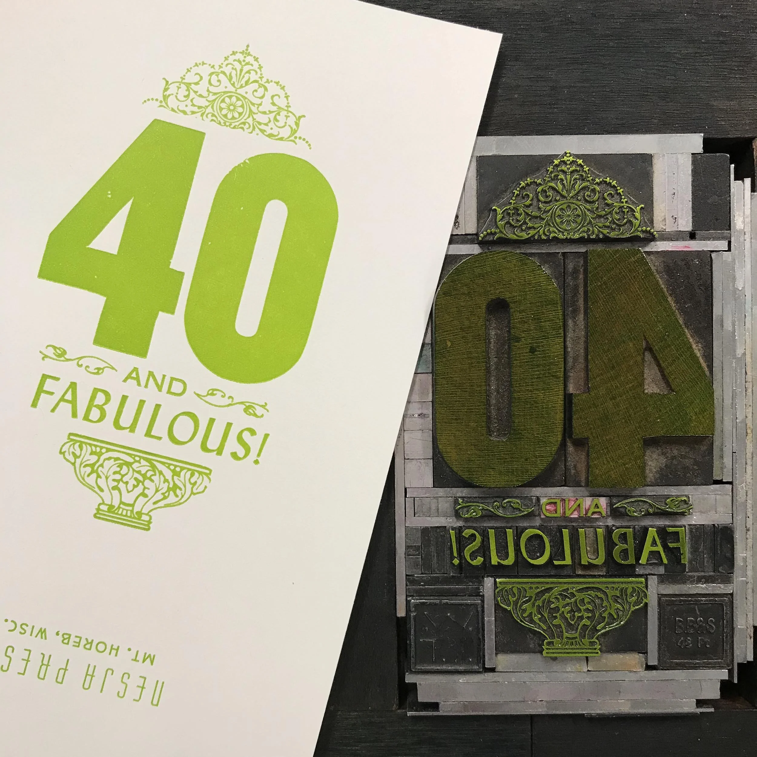 Wood and metal type lock up used to print 40 and Fabulous card in green ink.