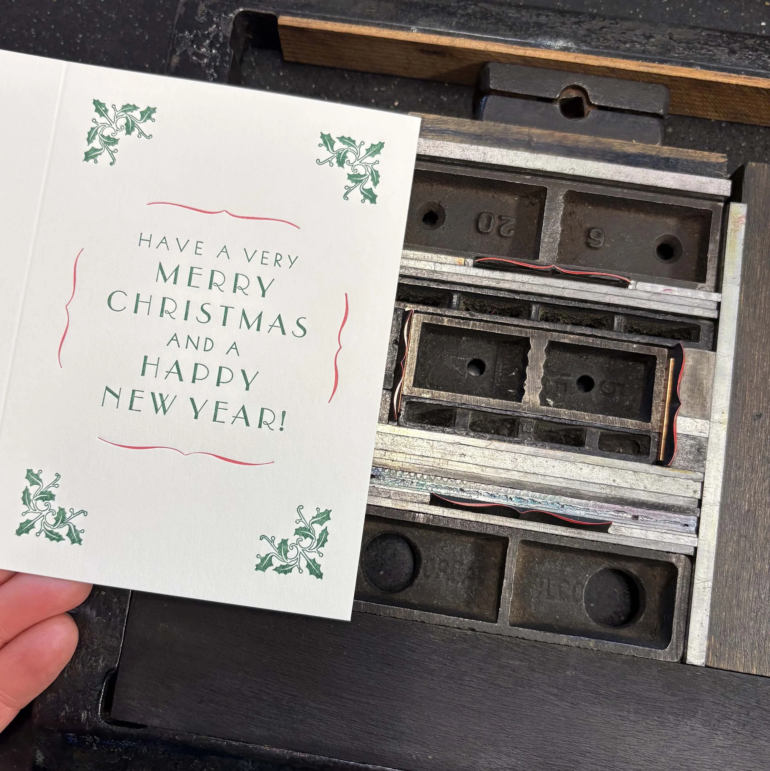 merry-christmas-happy-new-year-letterpress-cards-red-ink-lockup.jpg