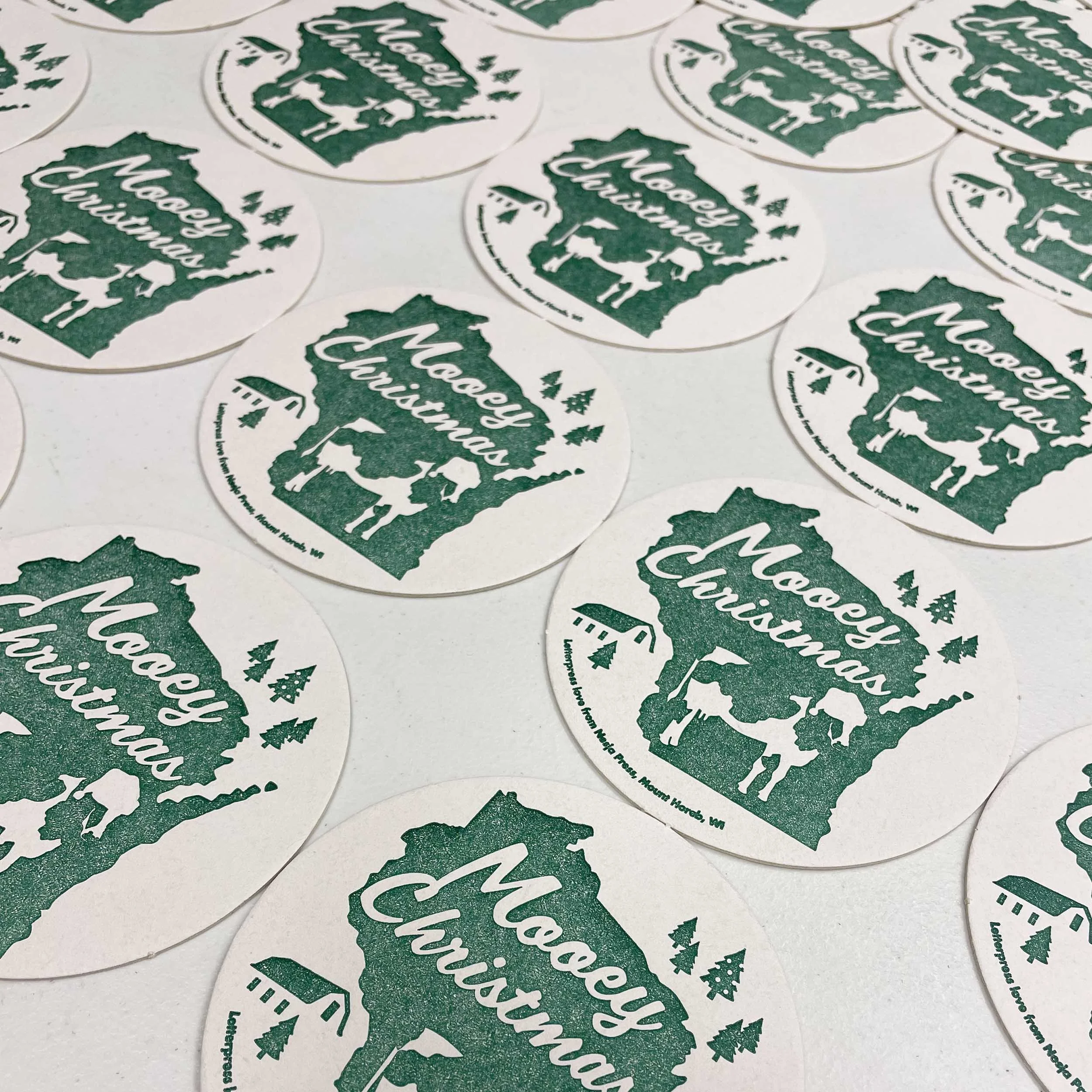 mooey-christmas-wisconsin-letterpress-ornament-green-ink.jpg