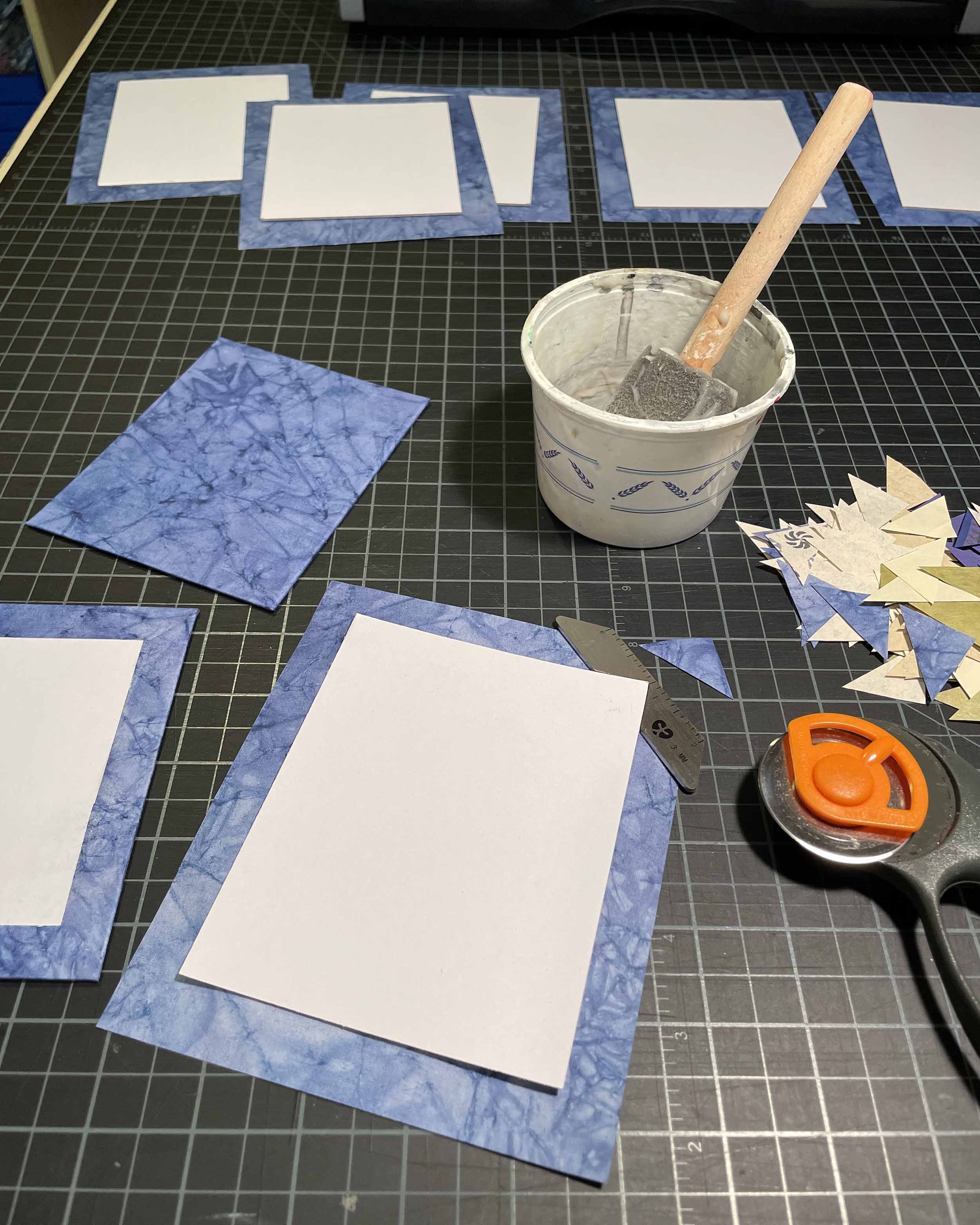 Gluing paper on boards with wheat paste