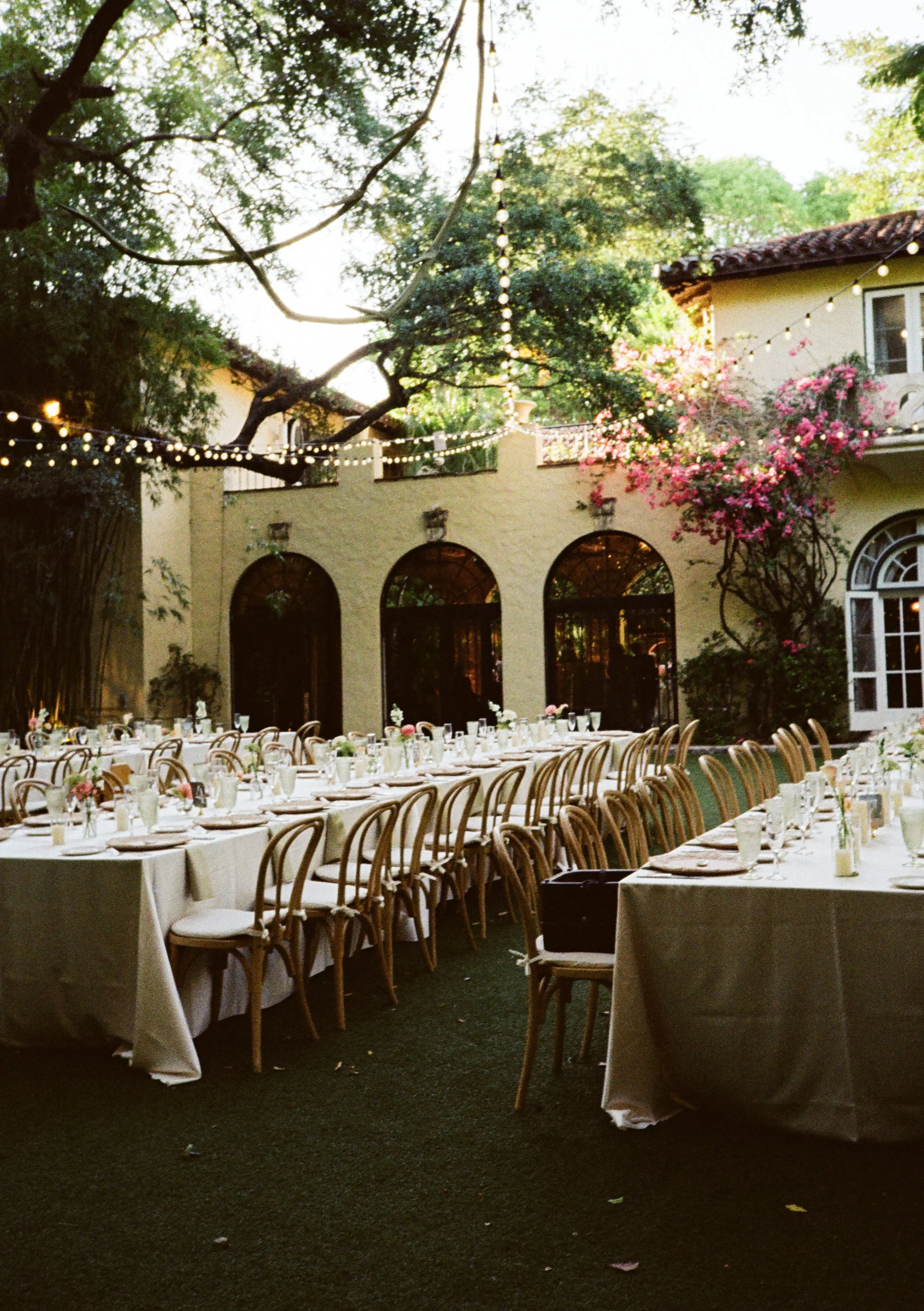 Guest tables set for wedding reception at Villa Woodbine
