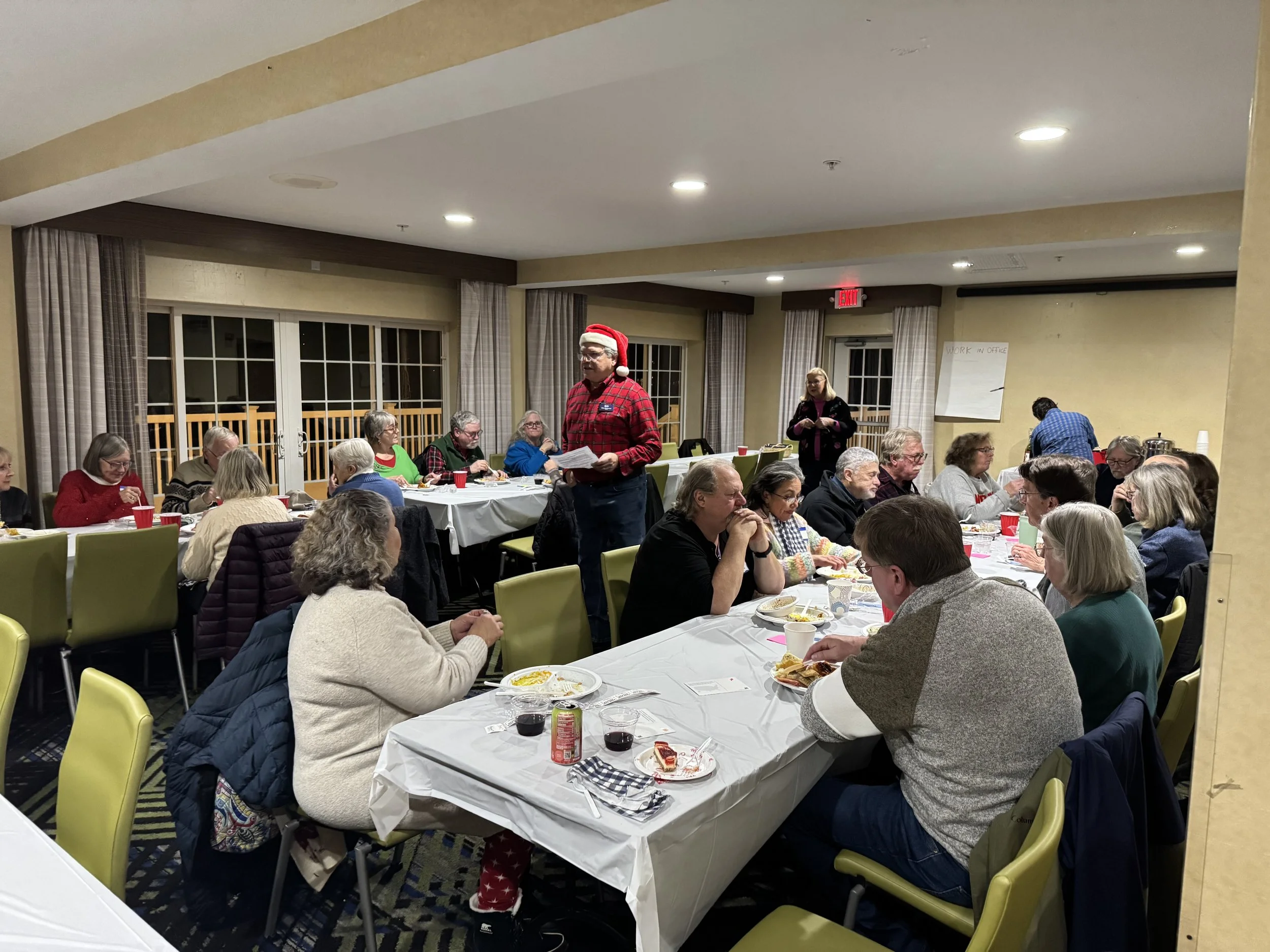 party Mike addressing group