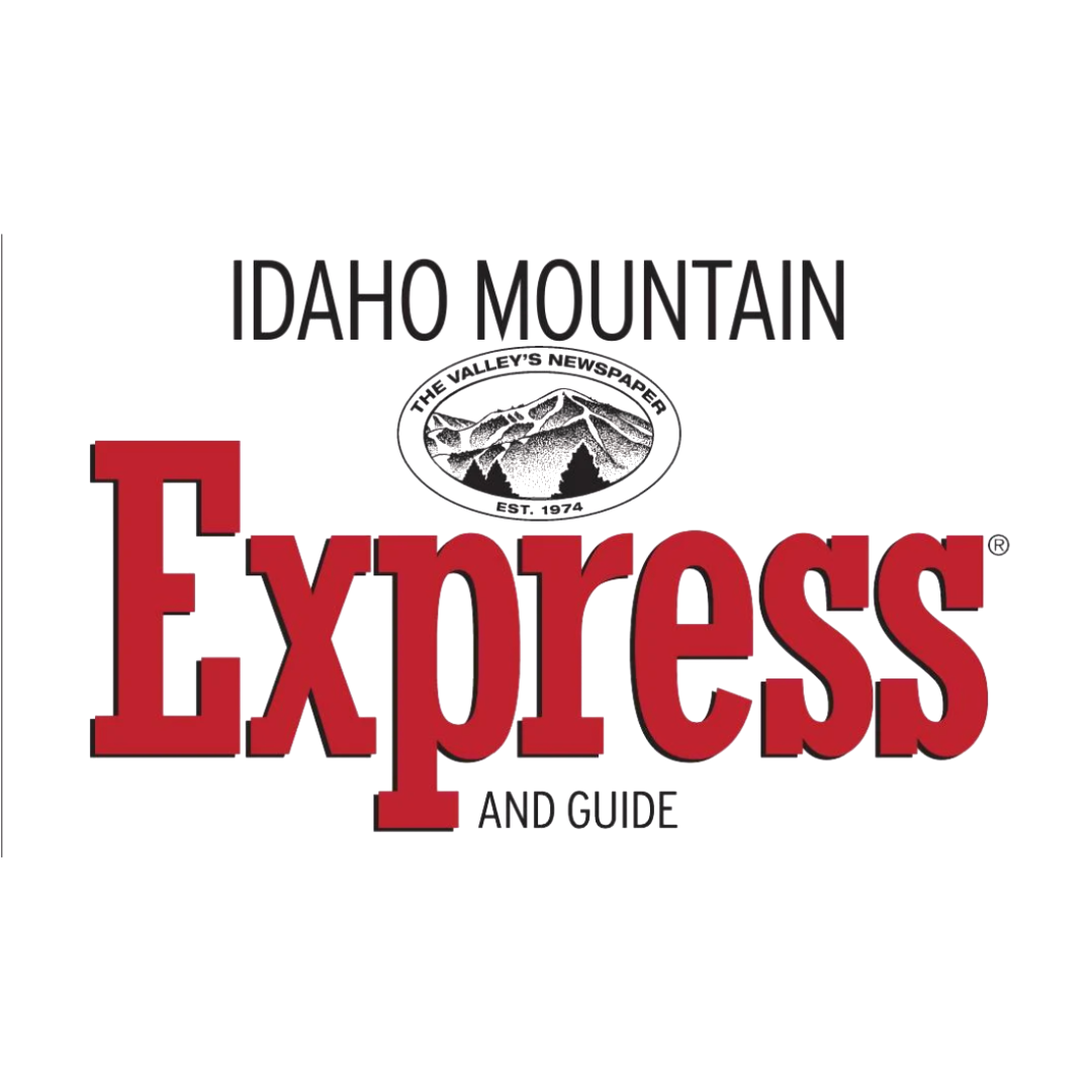 Cover of a guidebook titled 'Idaho Mountain Explores and Guide,' with a logo featuring mountains and trees.