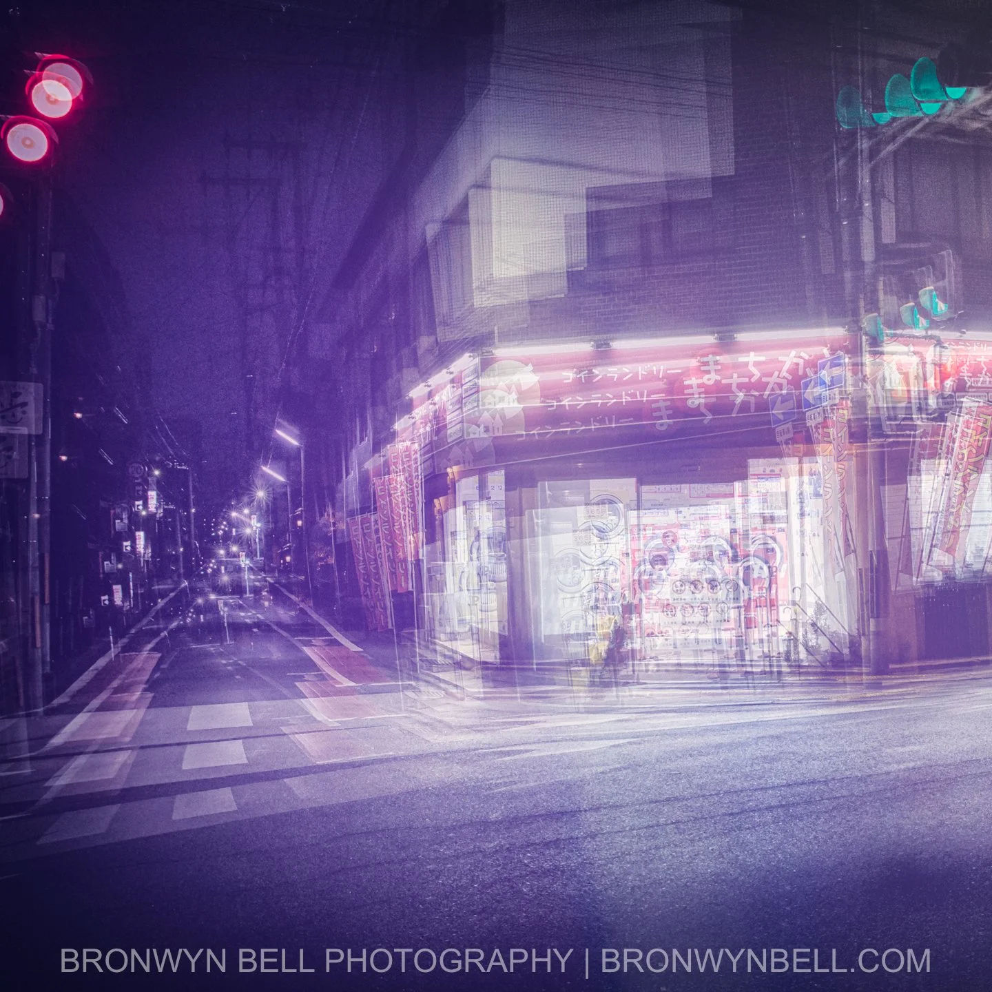 Behind the fogged glass of a dimly lit Kyoto laundromat, rows of washing machines hum softly, their circular doors catching the glow of a single overhead light. Outside, the rain-slick street mirrors the scene in fractured reflections, while multi-ex