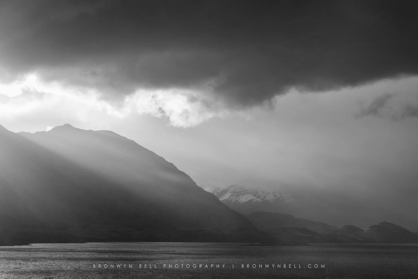Storm Light Over Wanaka – Sunset Through Rain Bands
