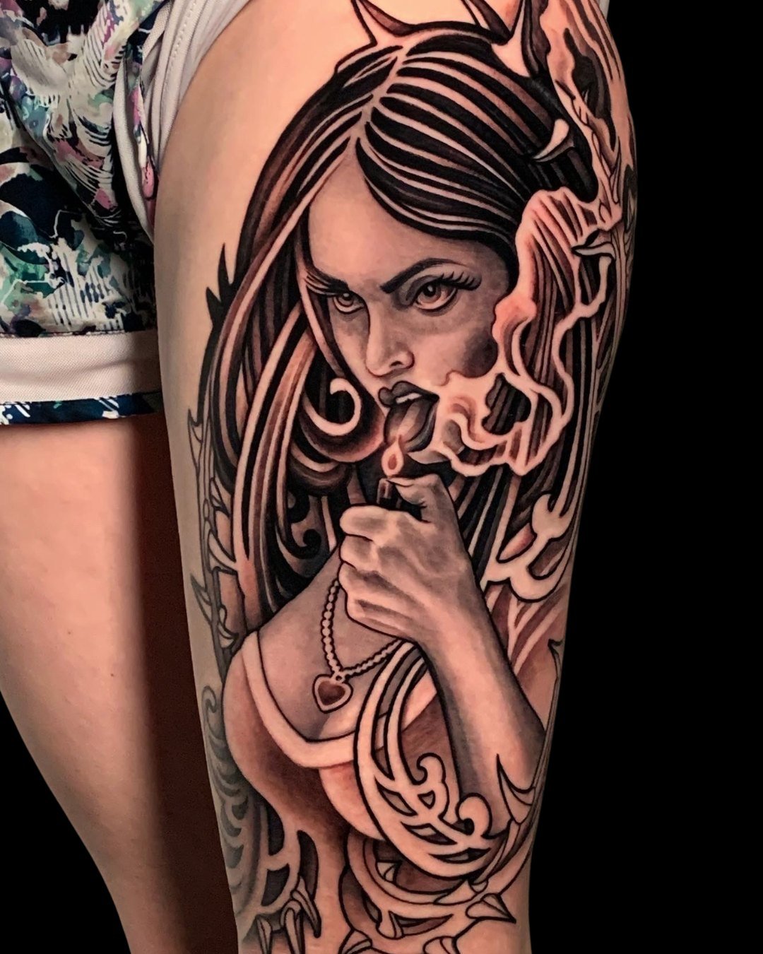 &quot;I am a god.&quot; ❤️&zwj;🔥

This black and gray illustrative Jennifer's Body tattoo by @izzytattoo1224 is on fire 🔥

Izzy's signature style combines bold, high contrast black ink with greywashing throughout to add dimension. He loves tattooin