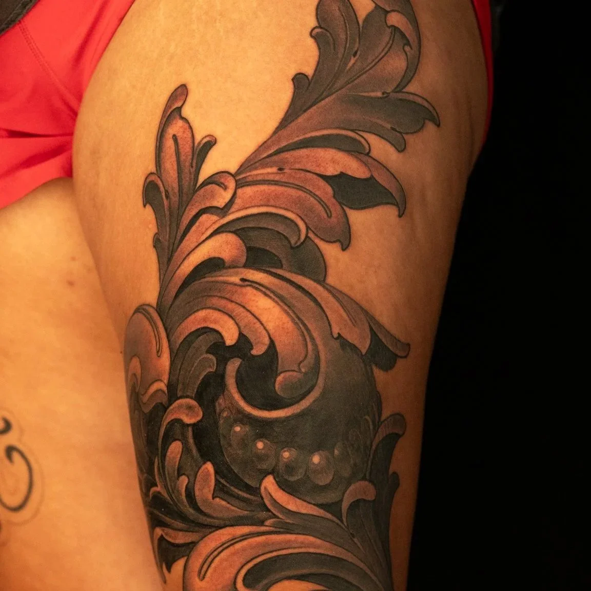 Why Black Tattoos Shine with Color Accents