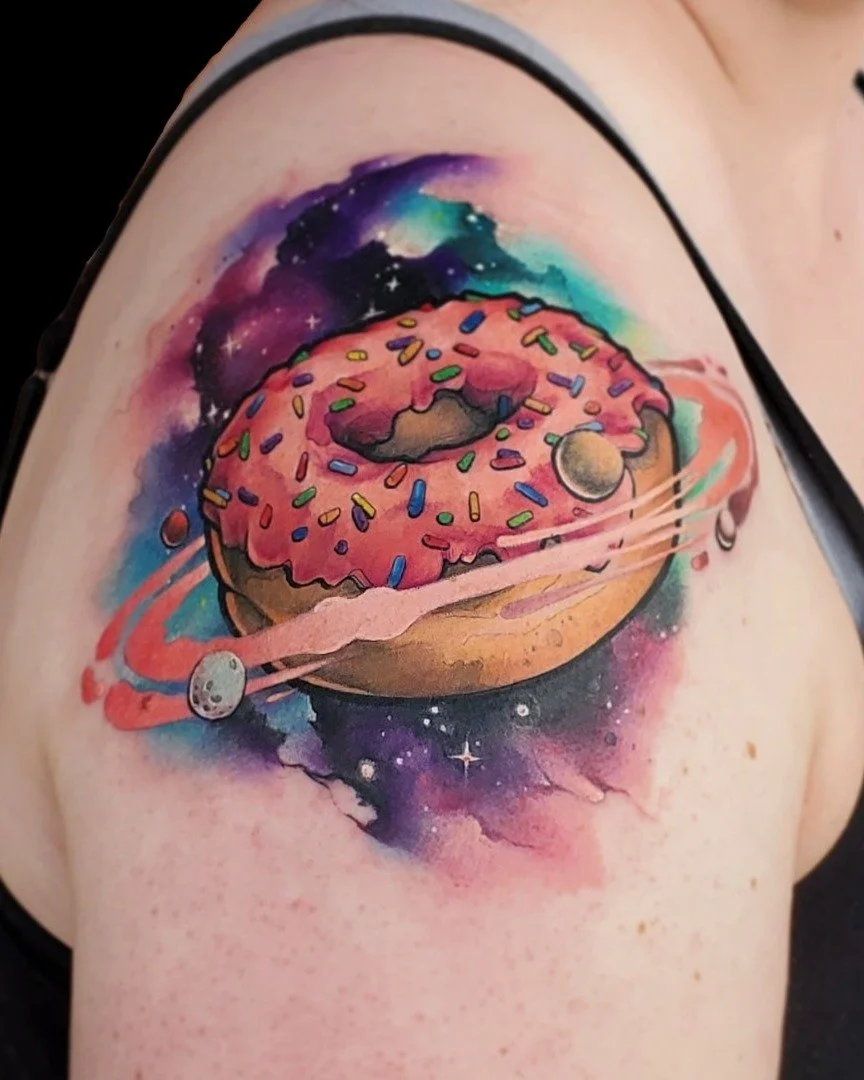 Space Donut done by @thejorell at Ink &amp; Dagger🍩

To book Flash or Custom tattoos with Jorell, tap the link in our bio to fill out a booking form or give us a call at 770-692-4245!

 #inkanddaggertattoo #roswell #roswelltattoo #roswelltattoos #ro
