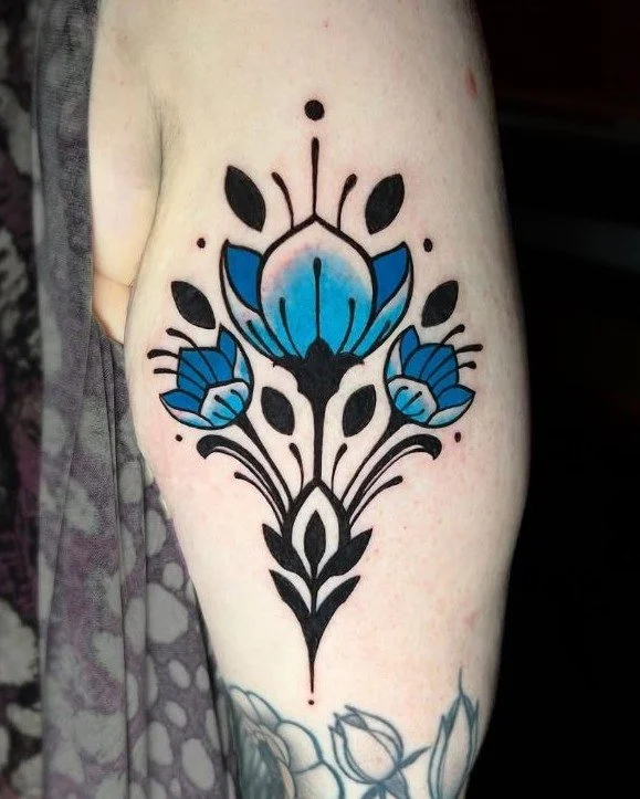 Folk Art Florals done by @cortneynorton at Ink &amp; Dagger🌸

To book Flash or Custom tattoos with Cortney, tap the link in our bio to fill out a booking form or give us a call at 770-692-4245!

 #inkanddaggertattoo #roswell #roswelltattoo #roswellt