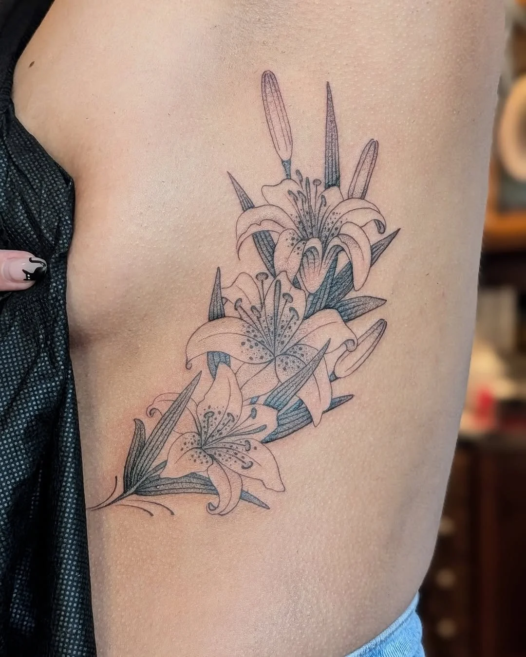Mark Kalinskiy - @kalinskiy_tattoo is tattooing at @inkanddaggertattoo give them a follow! - Lilies for Cierra. Thanks a lot!  @inkanddaggertattoo . . . #tattoo #tattooed #tattooartists #tattooidea #tattoolove #tatts #tattoos #tattooer #tattoodesign 