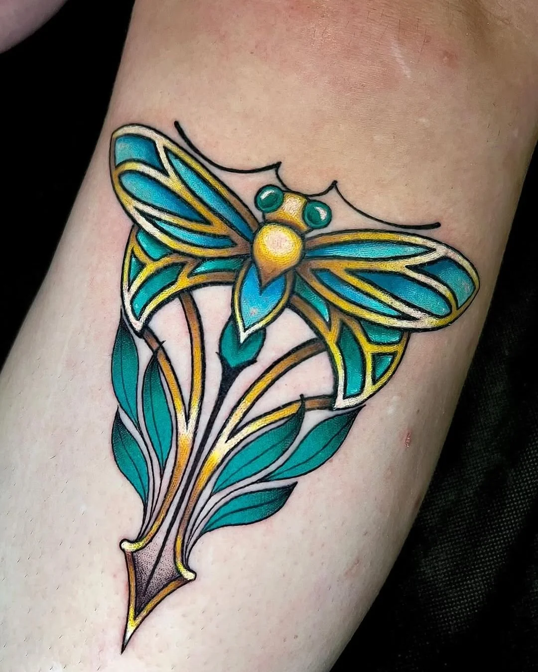 Cortney Norton - @cortneynorton is tattooing at @inkanddaggertattoo give them a follow! - Art Nouveau inspired dragonfly just under her knee ✨ &bull; &bull; &bull; #dragonfly #artnouveau  #inkanddagger #inkanddaggertattoo #tattoodesign #designtattoo 