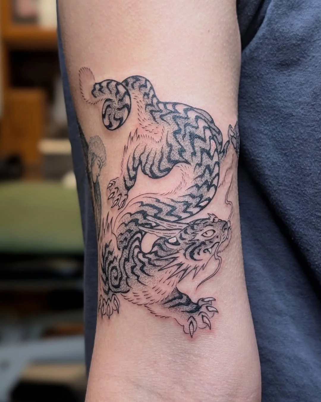 Mark Kalinskiy - @kalinskiy_tattoo is tattooing at @inkanddaggertattoo give them a follow! - Tigon for @sophiascott  I love this idea and the design I was able to put together.  @inkanddaggertattoo . . . #tattoo #tattoos #finelinetattoo #blackandgrey