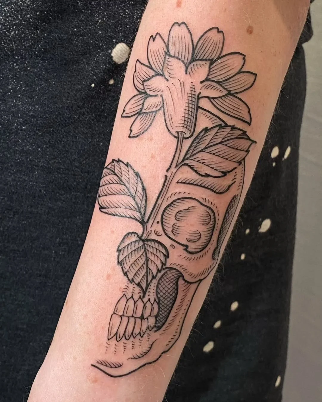 Luis Hinestroza - @luismiguel_ta2 is tattooing at @inkanddaggertattoo give them a follow! - Etching style skull and flower from a while back. I love simple designs like this because I can focus more on the details and contrast to make it interesting!