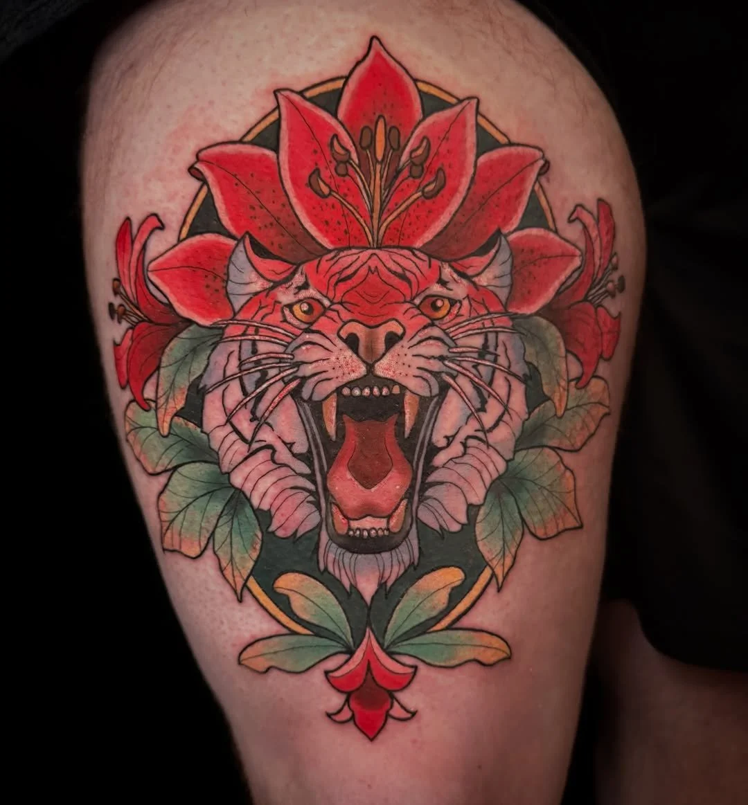 Mel Perlman - @mizmeltattoos is tattooing at @inkanddaggertattoo give them a follow! - A tiger with lilies&hellip; a tiger lily, if you will.  If this piece speaks to you, I&rsquo;d love to create something similar&mdash;click the link in my bio to b