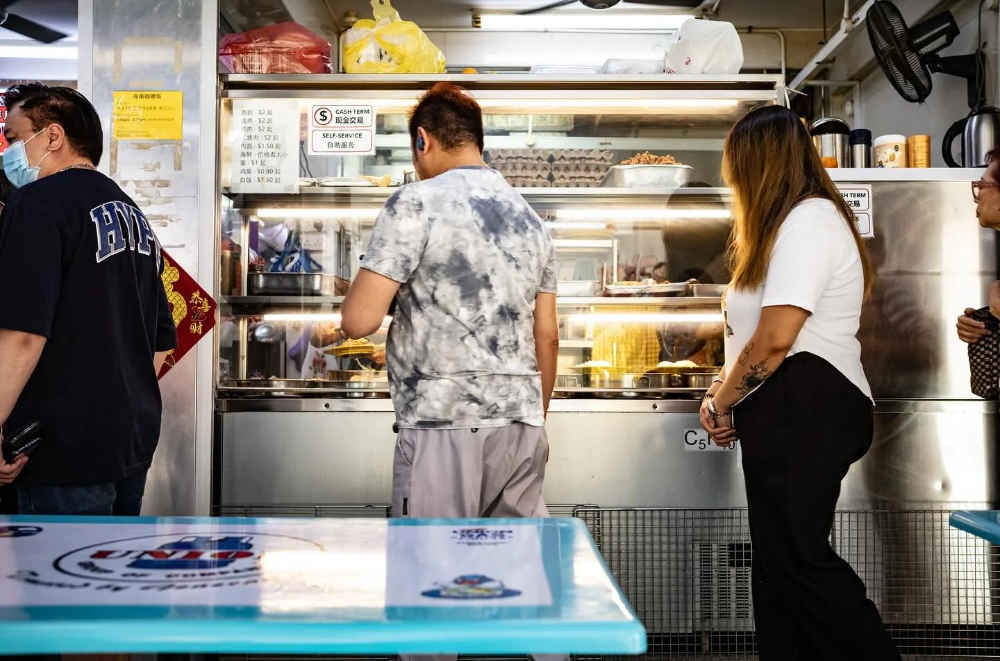 Plates of Legacy- The closure of the no-name Hainanese curry rice stall at Beo Crescent marks more than the end of a meal.
Over the years, I&rsquo;ve photographed this space on almost every trip I have made to Singapore. Each frame is a reminder that