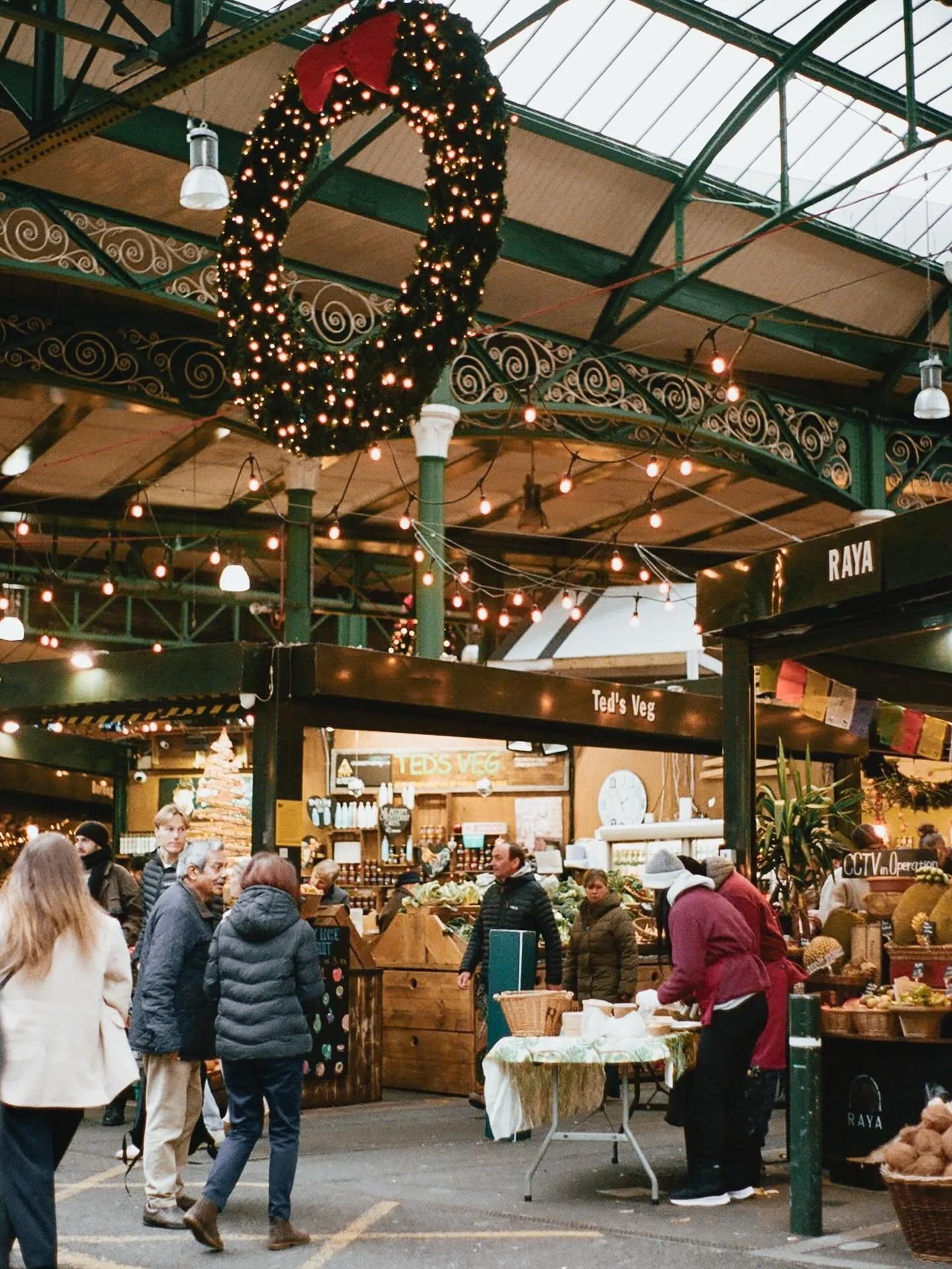 Festive Market Scenes - Street films looking a bit different with Christmas decorations all over . The market begins to feel busier as they prepare for one of the busiest times of the year. Despite having short daylights and also rare winter sun, the