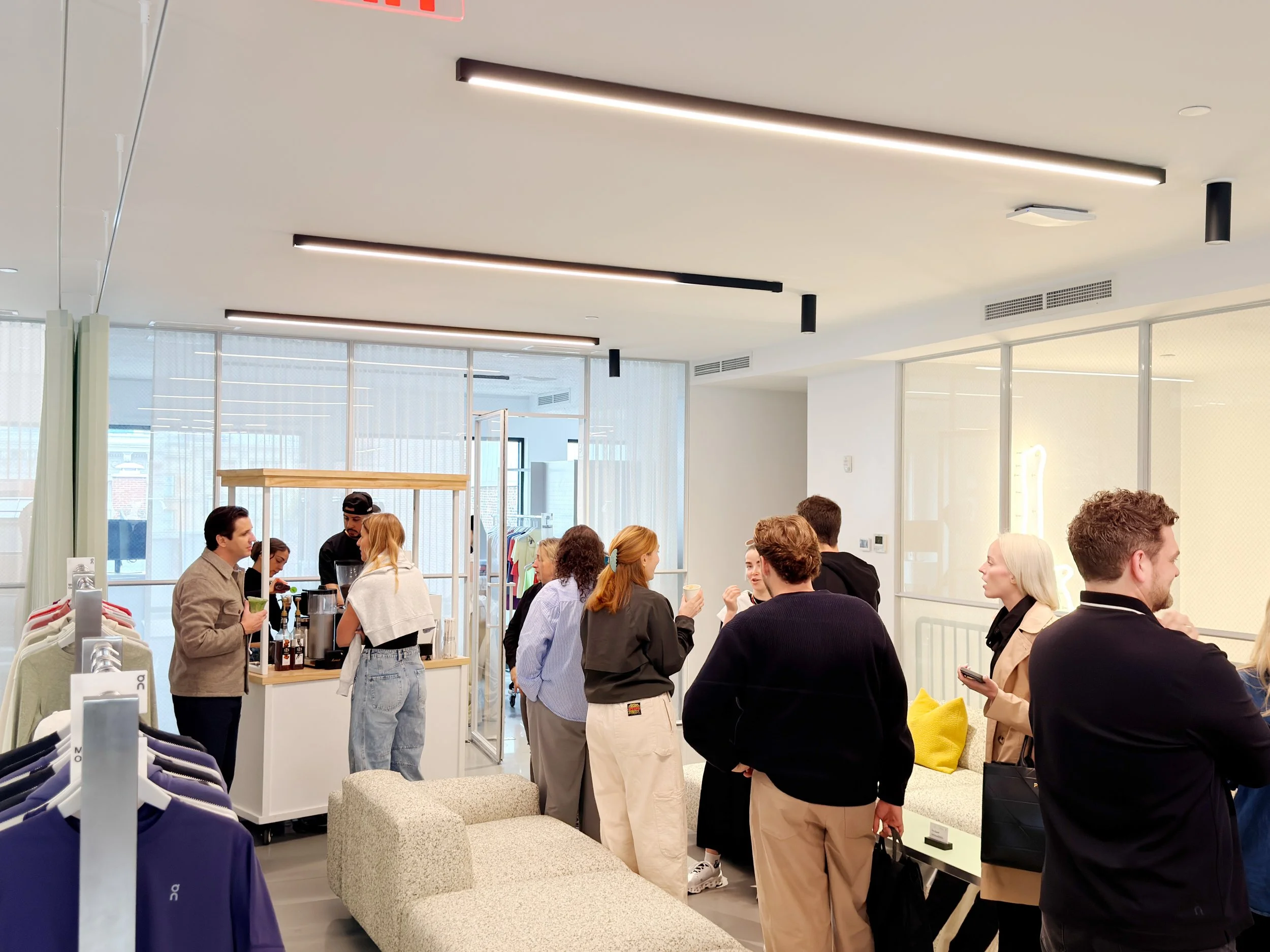 team members of the office, line up to order a coffee in the A Place Coffee Cart NYC