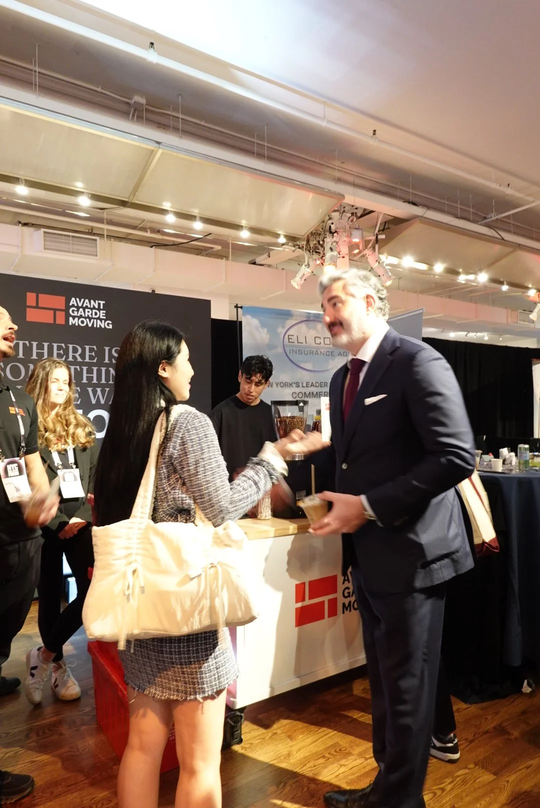 Guests networking next to our coffee cart