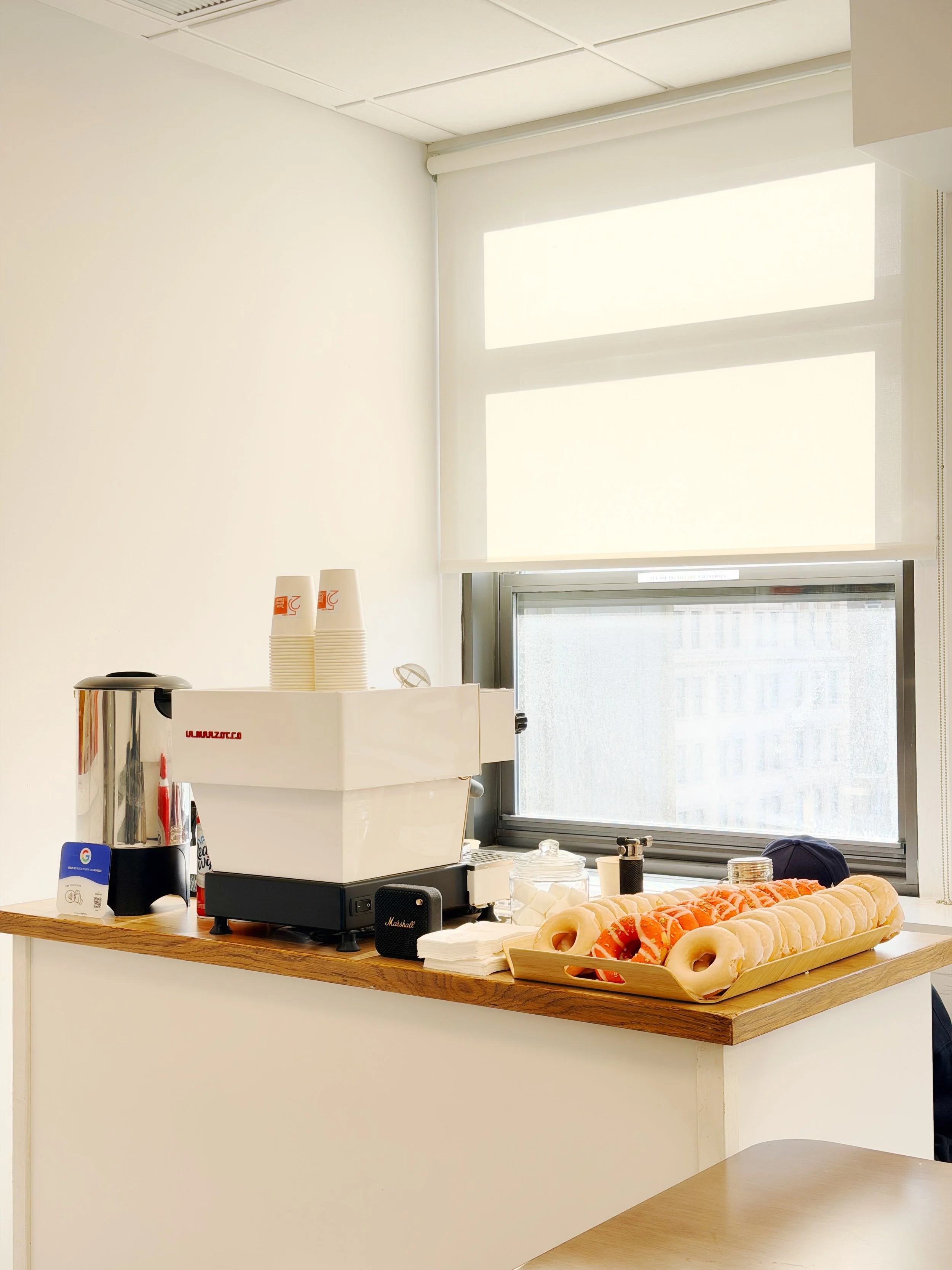 donuts service next to a coffee catering cart bar