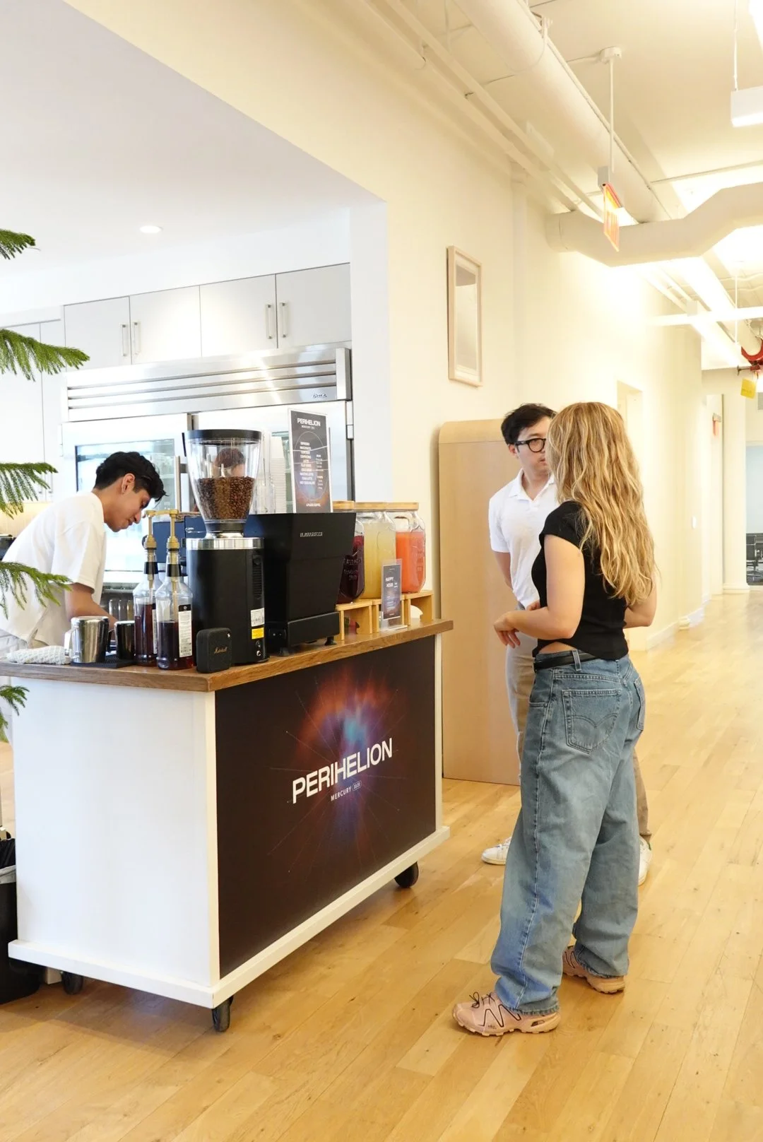 mobile barista making espresso based drinks to the guests on line