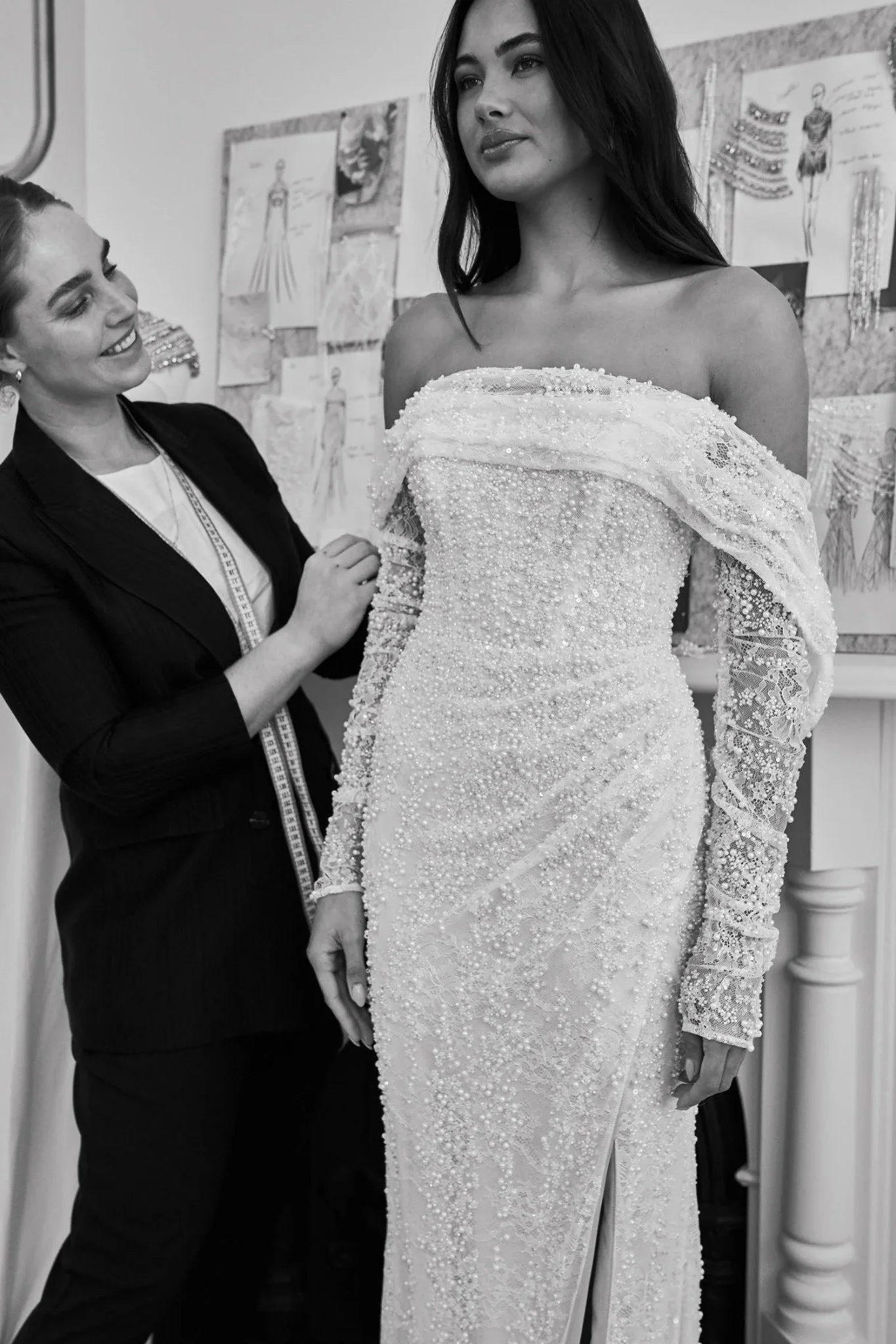 image of Anna Campbell with a bride in studio