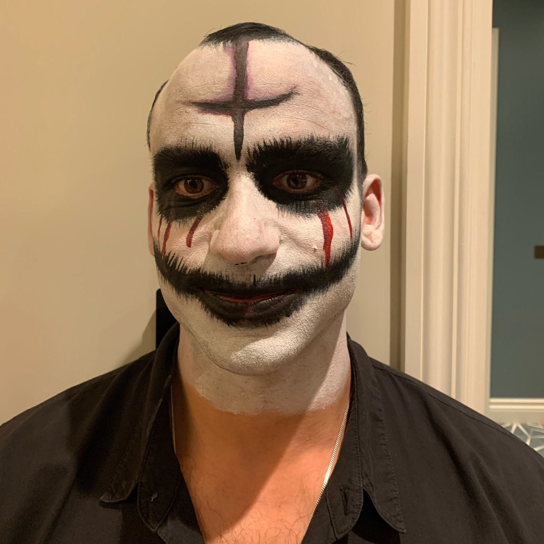 The photo features a chilling demonic priest Halloween look, created with intense detail by Suhaila. The makeup combines dark, satanic elements with dramatic artistry for a truly unsettling and striking appearance.
