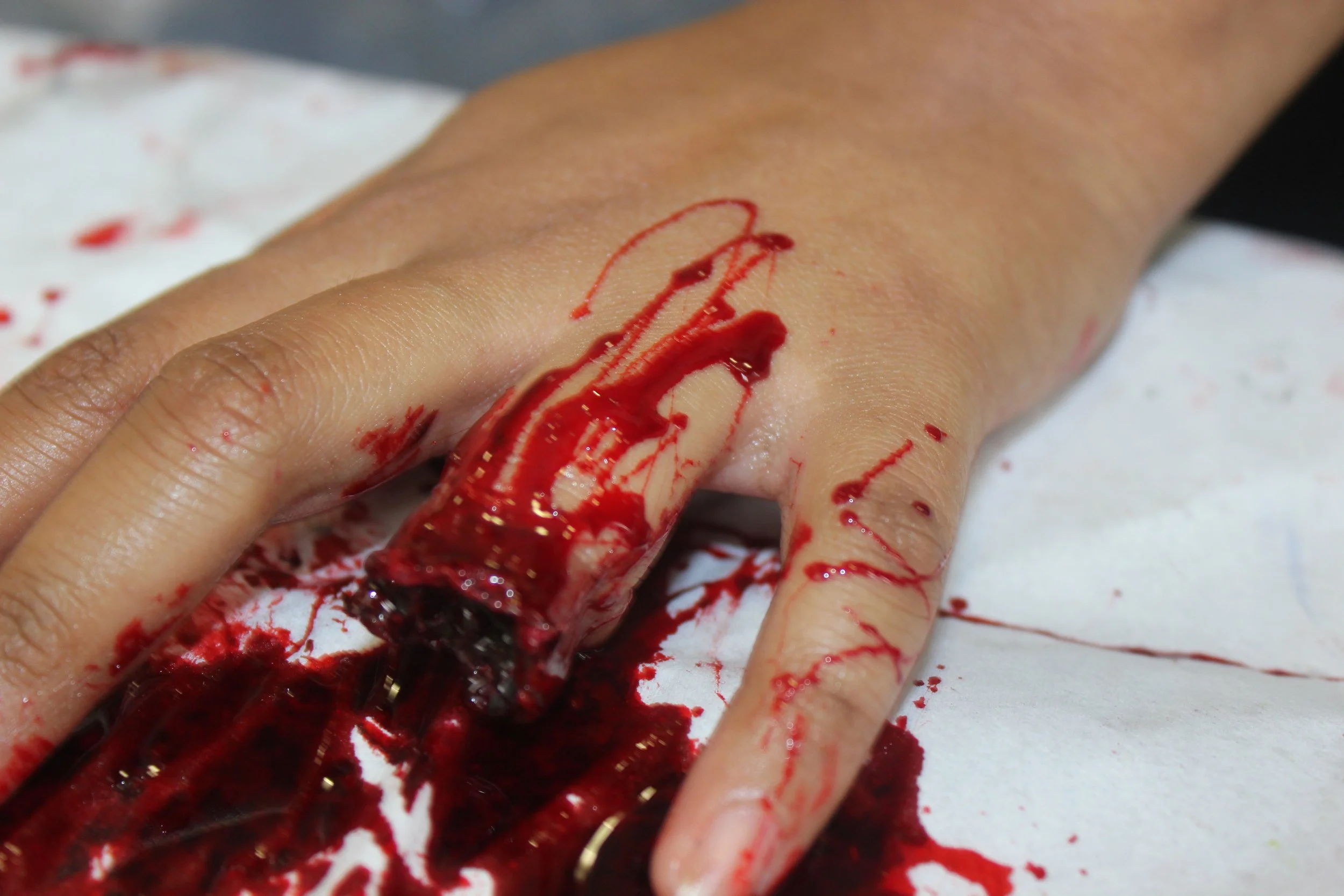 The photo vividly captures Frodo’s missing finger after Gollum seizes the Ring, with striking special effects crafted by Suhaila. The intense detail brings this iconic moment from *The Lord of the Rings* to life.