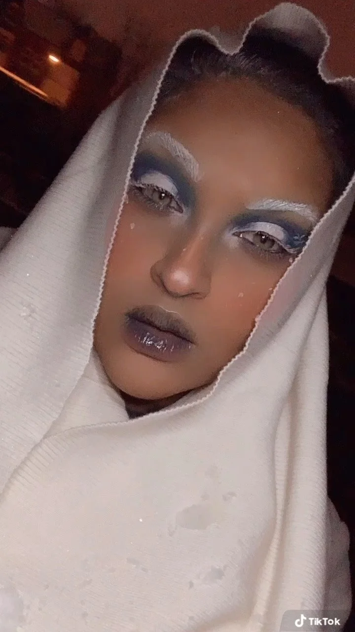 The photo features an avant-garde Ice Queen Halloween look, crafted by Suhaila. The innovative makeup design blends frosty elegance with artistic flair for a truly captivating and unique appearance.