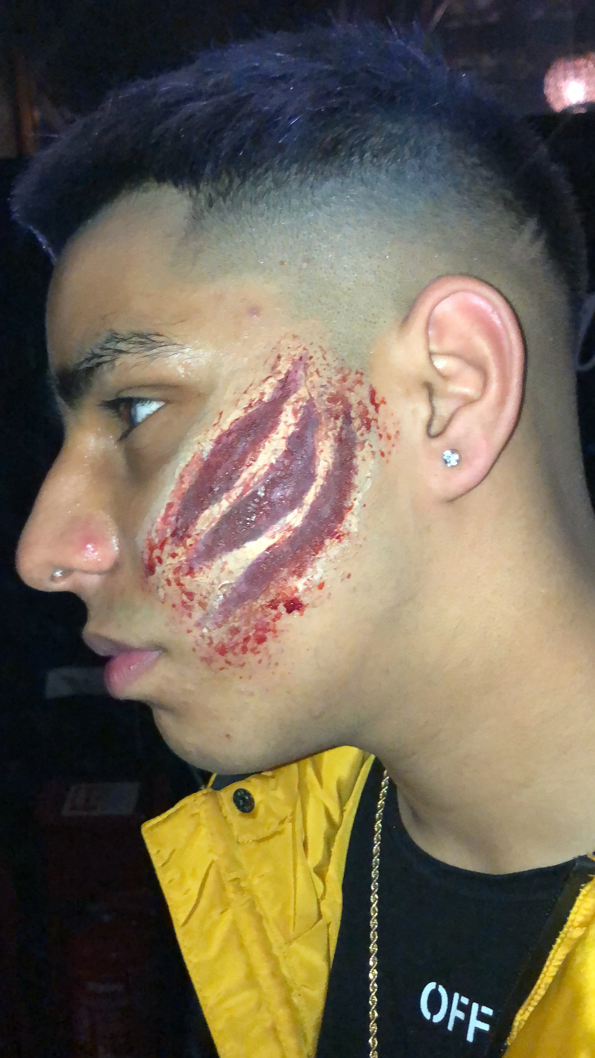 The photo showcases a dynamic Wolverine Halloween look, expertly crafted with SPX makeup by Suhaila at Arabesque Lounge. The detailed design captures Wolverine’s iconic features with impressive realism and intensity.