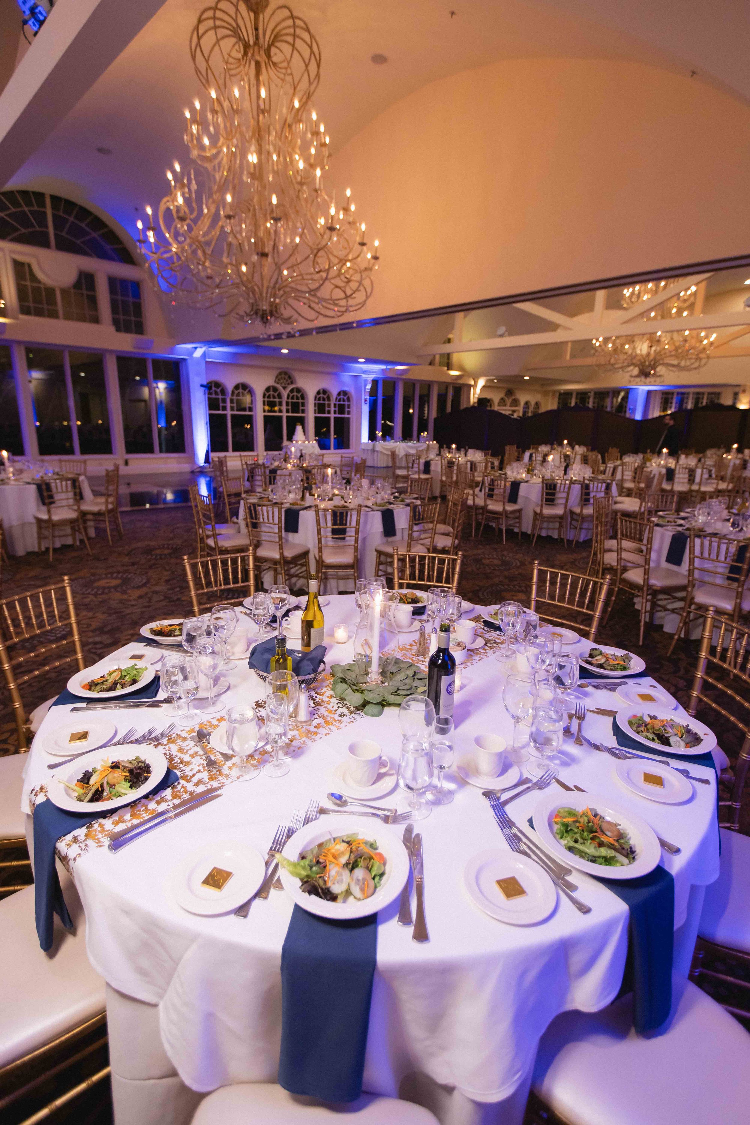 Round table set for dinner reception at the waterview wedding venue in monroe ct