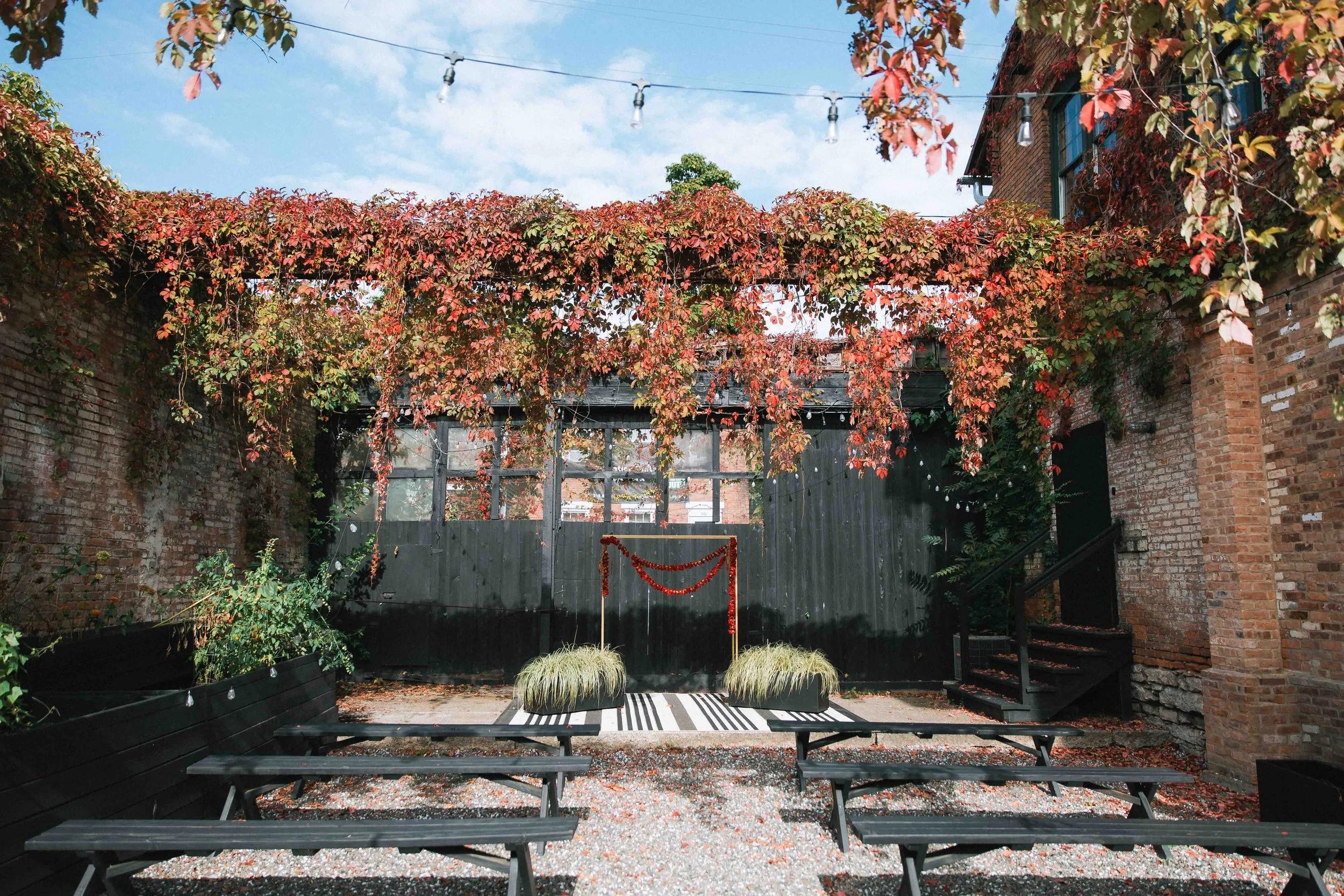 The terrace at boho luxury wedding venue canonball factory in downtown Hudson NY
