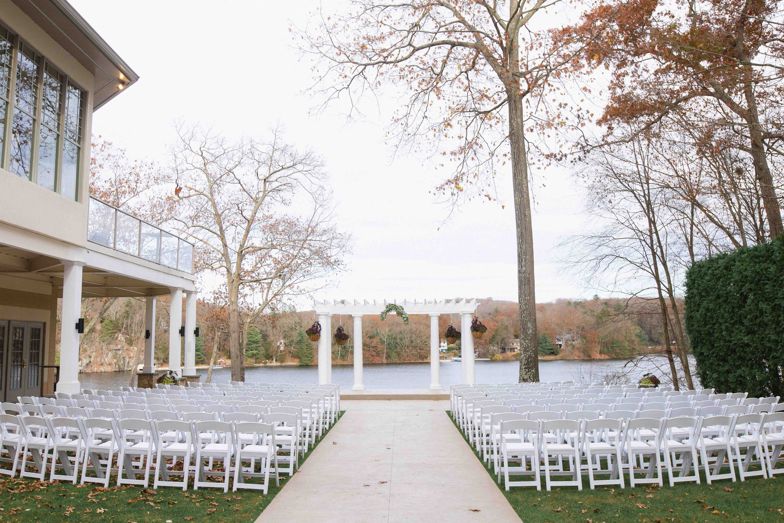 Late fall at the outdoor wedding ceremony space of the waterview wedding venue in monroe ct