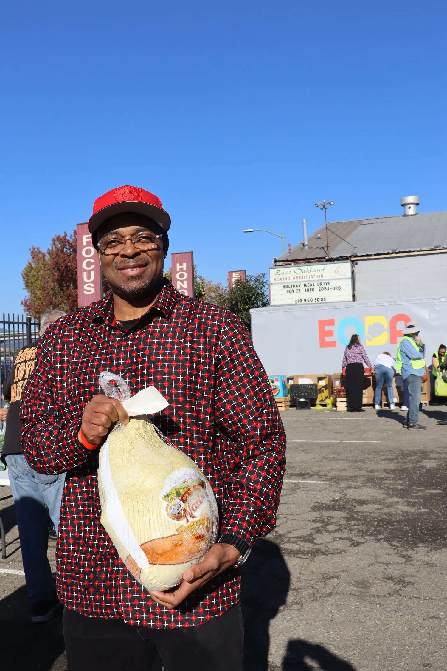 Community member with holiday meal supplies